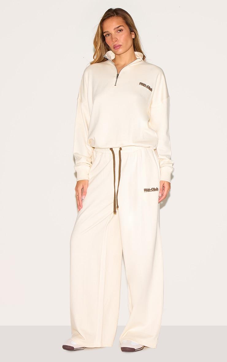 Cream Run Club Puff Print Quarter Zip Sweatshirt Product Image