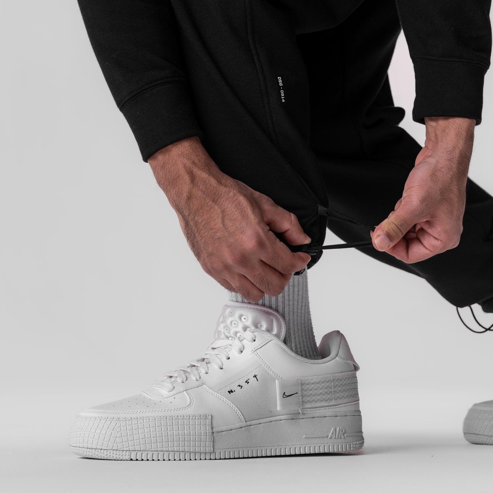 0914. Tech-Terry™ Paneled Cinch Cargo Jogger - Black/Wave-Dye Product Image