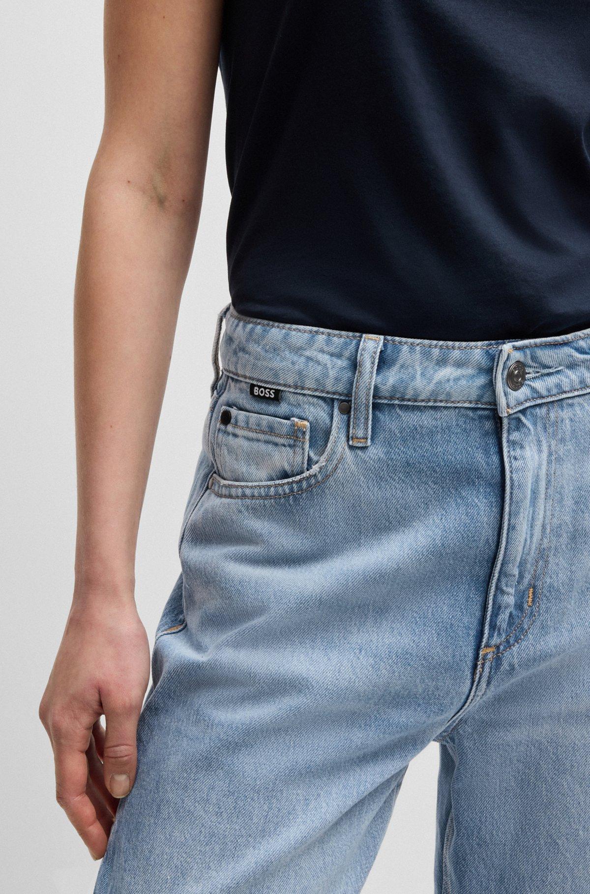 Wide-leg jeans in blue denim with stepped hem Product Image