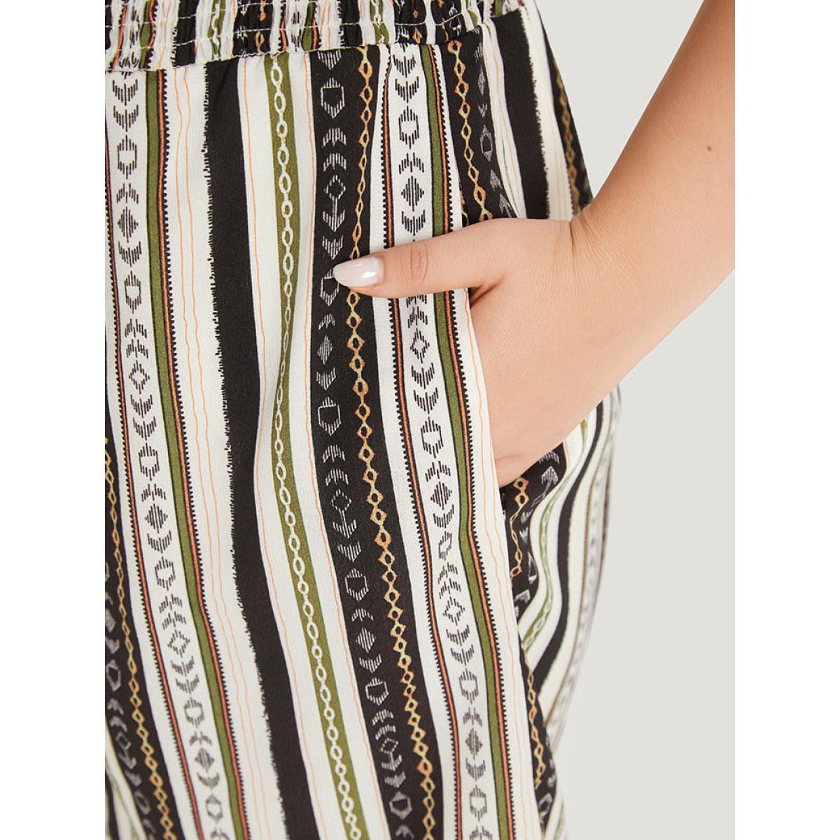 Plus Size Multicolor Boho Print Shirred Cut Out Tassel Trim Romper Women Elegant Short sleeve V-neck Dailywear Loose Jumpsuits BloomChic 30/6X Product Image