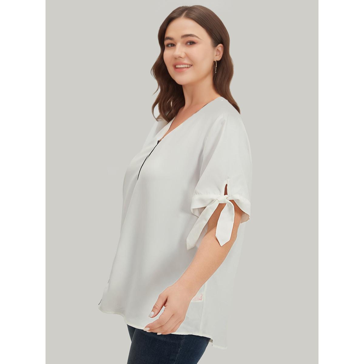 Plus Size Ivory Contrast Trim Knot High Low Hem Blouse Women Office Short sleeve V-neck Office Blouses BloomChic 10/M Product Image