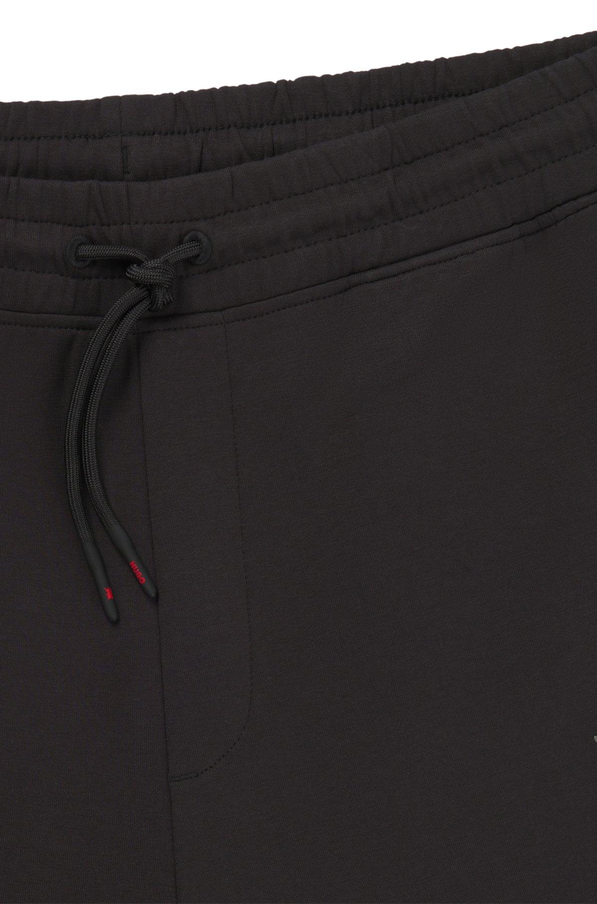 HUGO x RB tracksuit bottoms with piping details Product Image