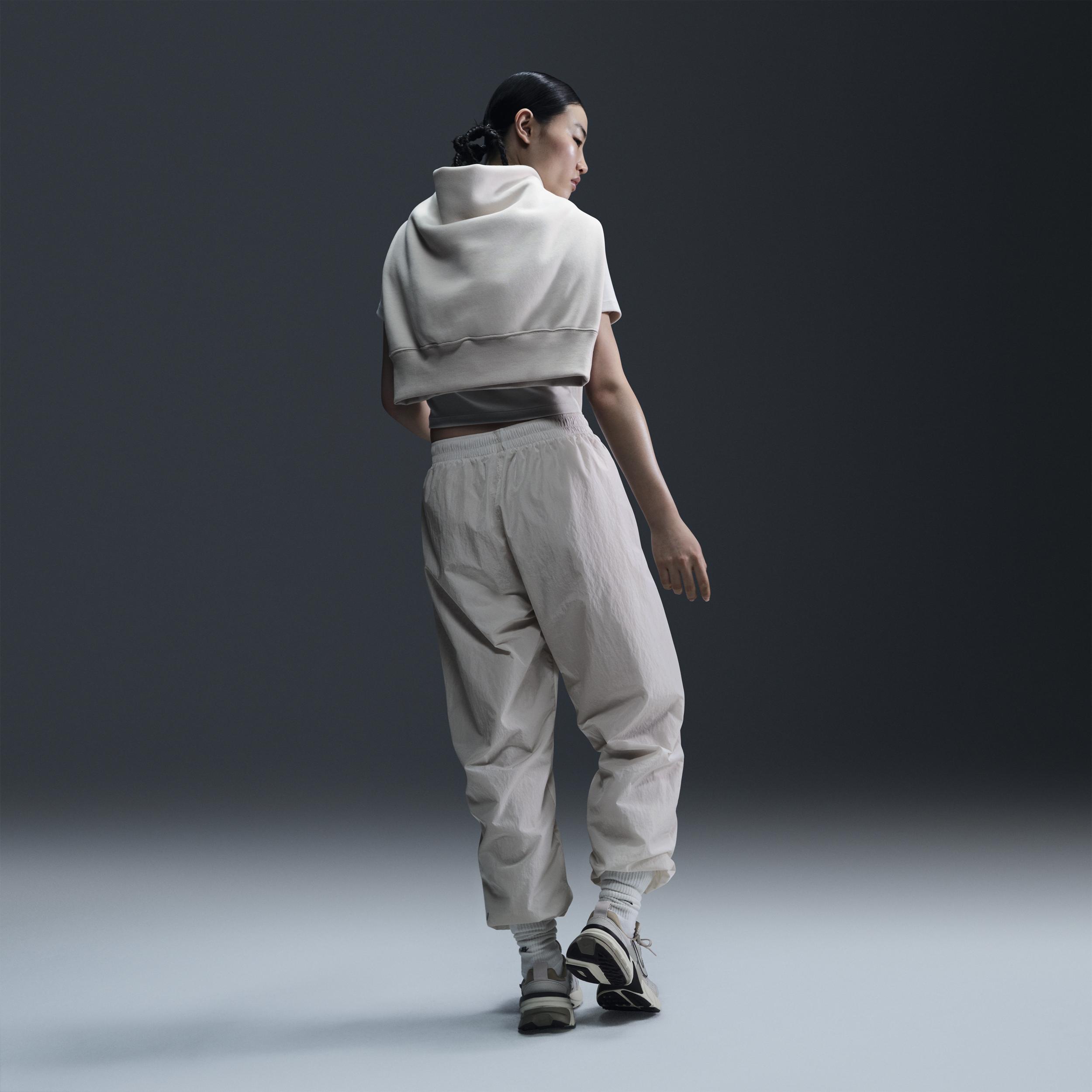 Women's Nike Sportswear Essential Mid-Rise Oversized Woven Jogger Pants Product Image