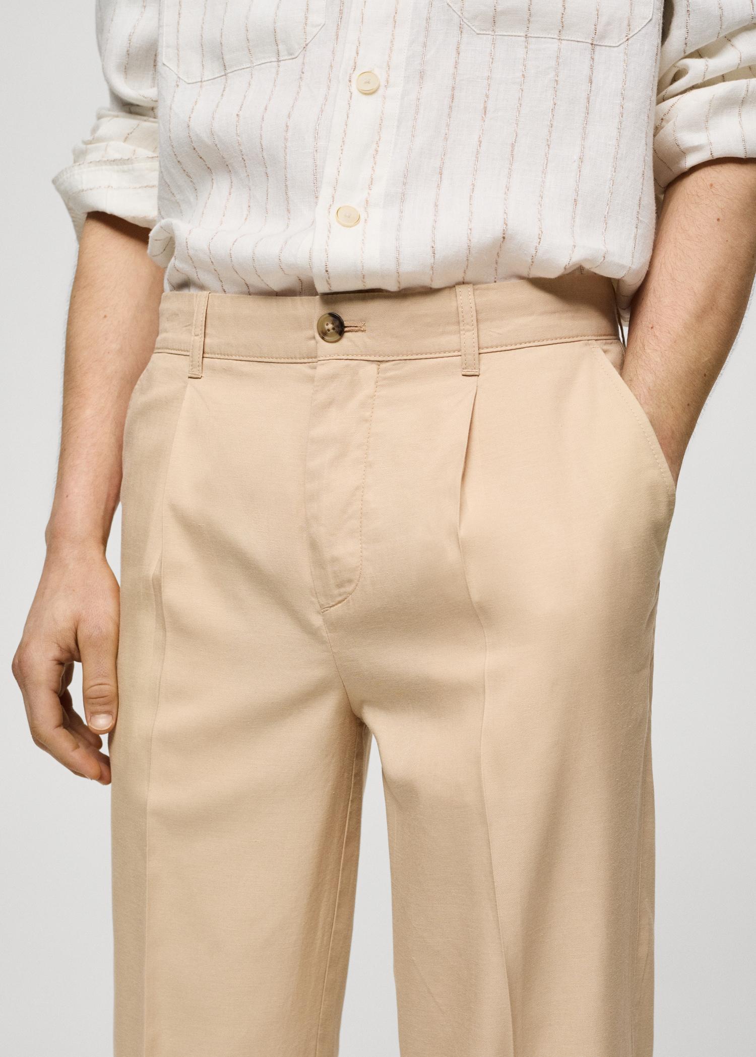 Cotton lyocell pleated pants - Men | MANGO USA Product Image