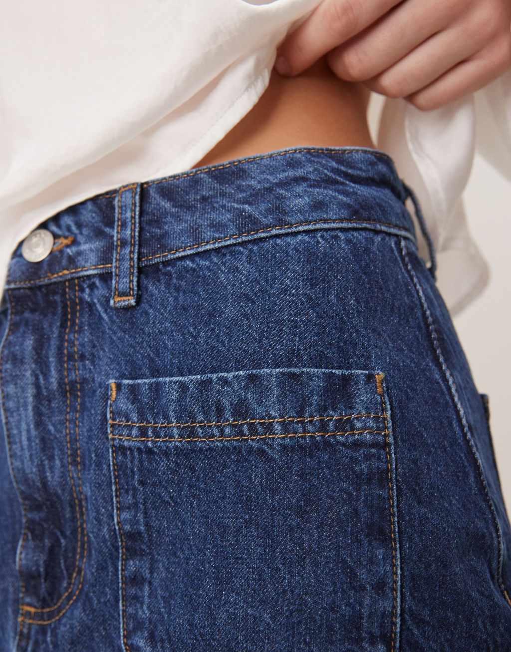 ASOS DESIGN denim patch pocket mini skirt in indigo Product Image
