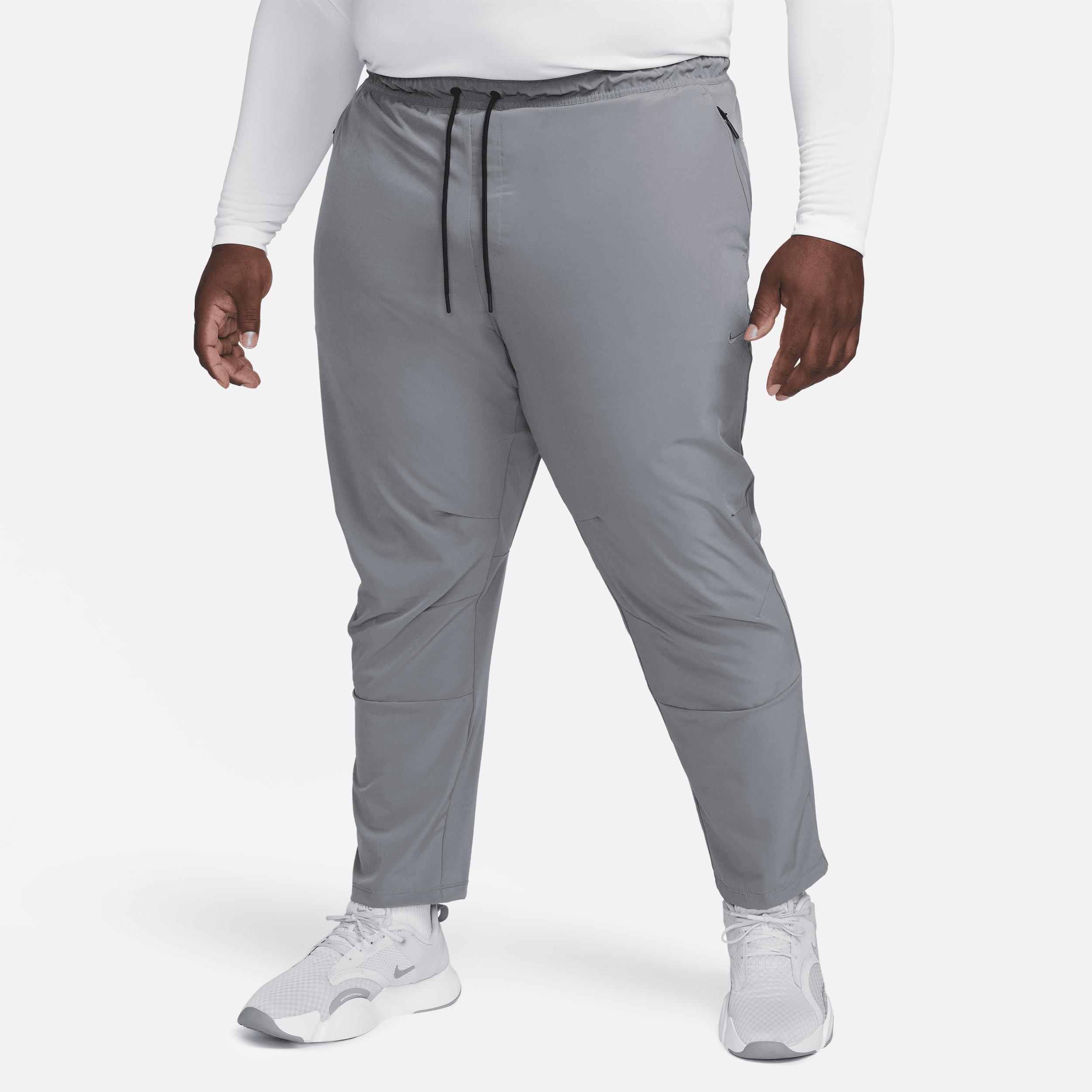 Nike Mens Unlimited Dri-FIT Tapered Leg Versatile Pants | FB7546-084 Product Image