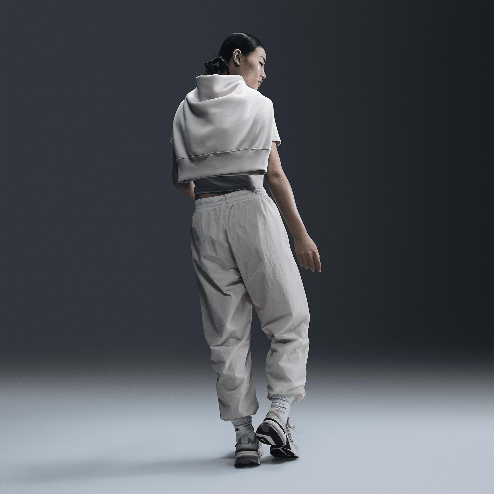Women's Nike Sportswear Essential Mid-Rise Oversized Woven Jogger Pants Product Image