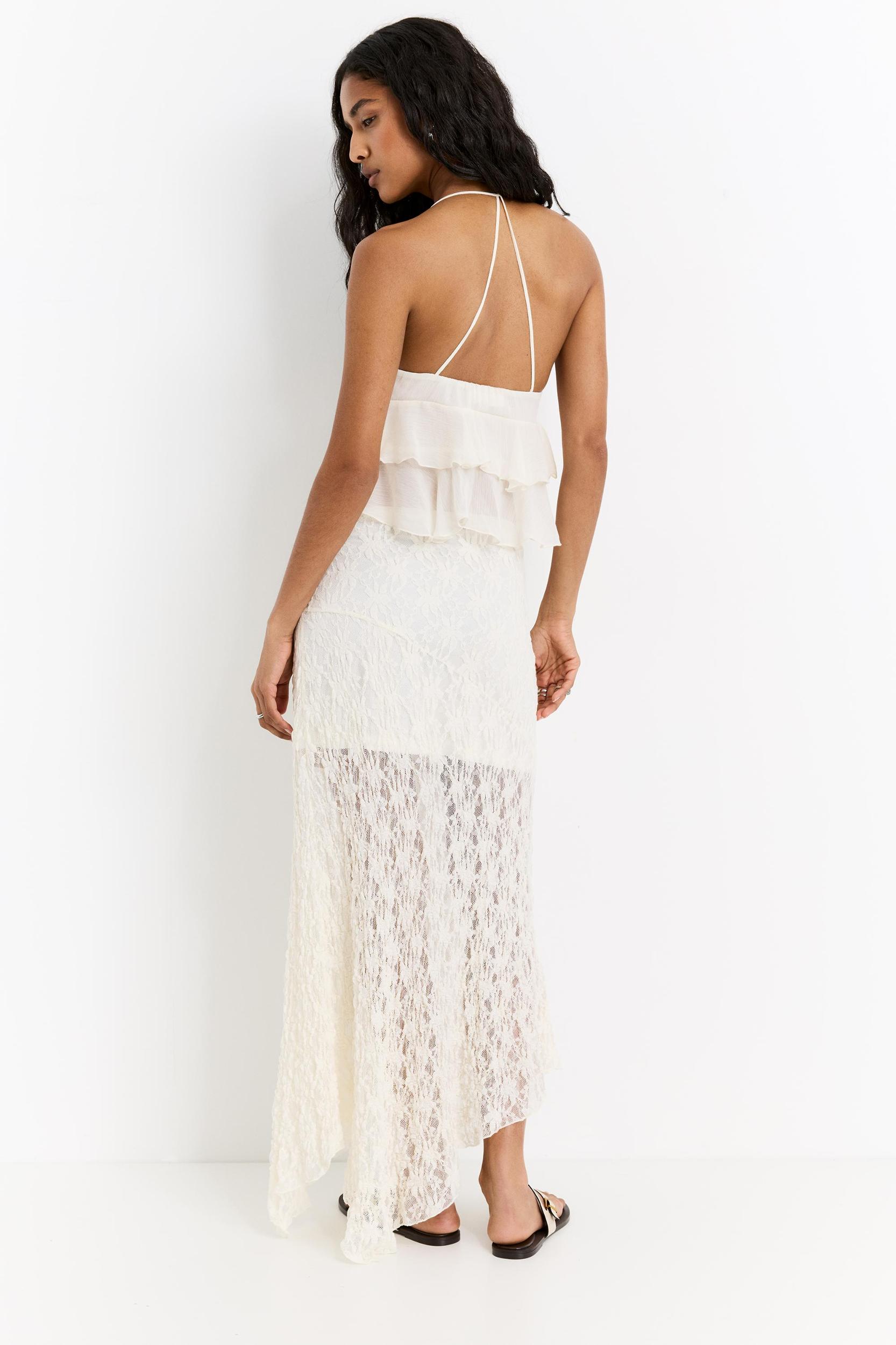 Ruffled top with bow Product Image