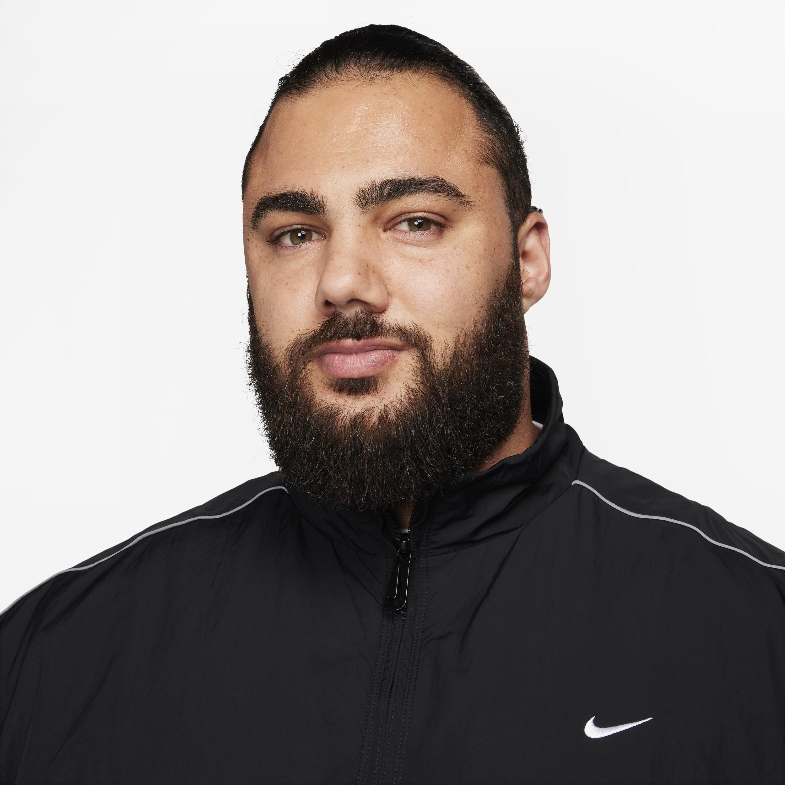 Men's Nike Sportswear Solo Swoosh Woven Track Jacket Product Image