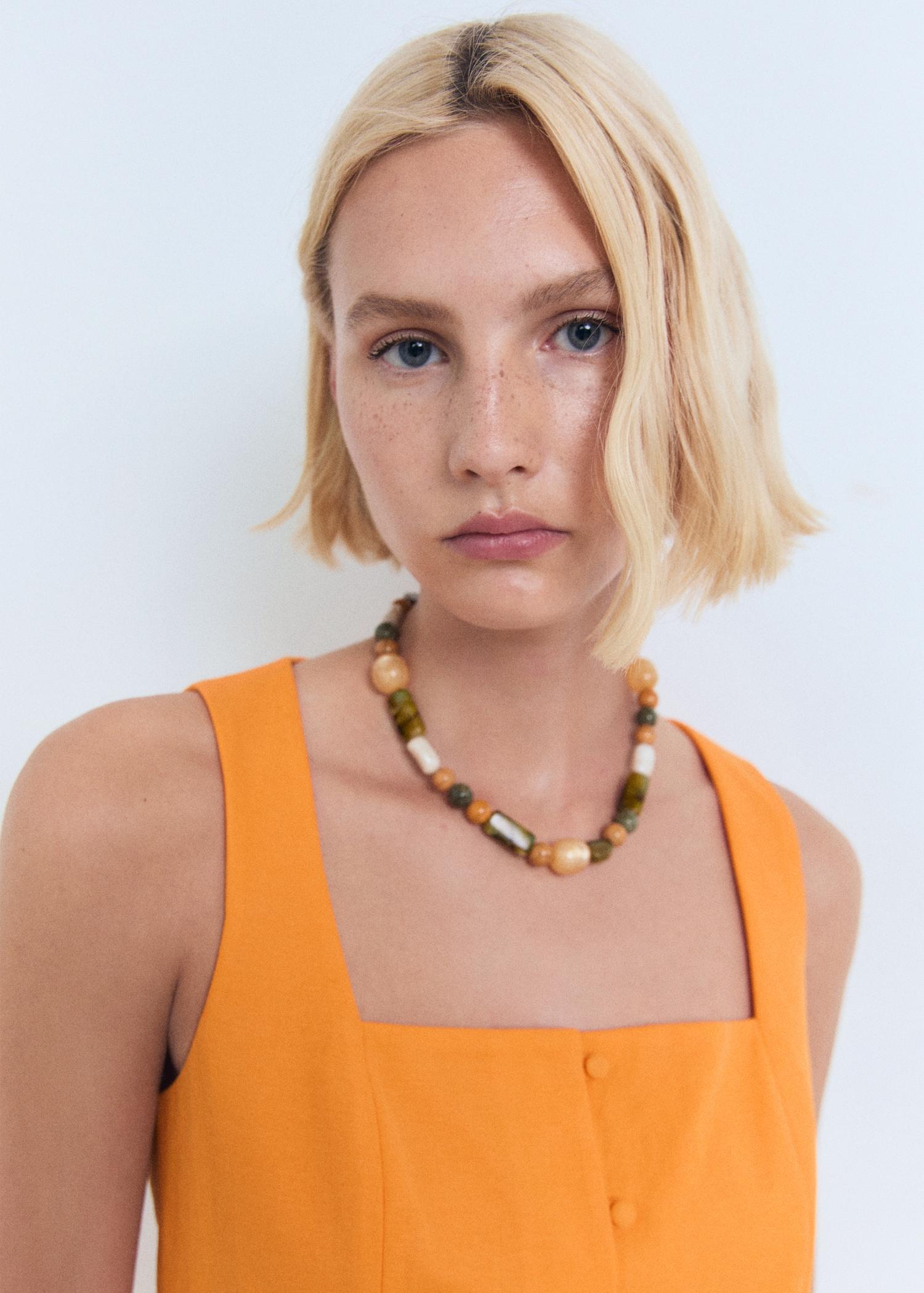 Buttons cotton top - Women | MANGO USA Product Image