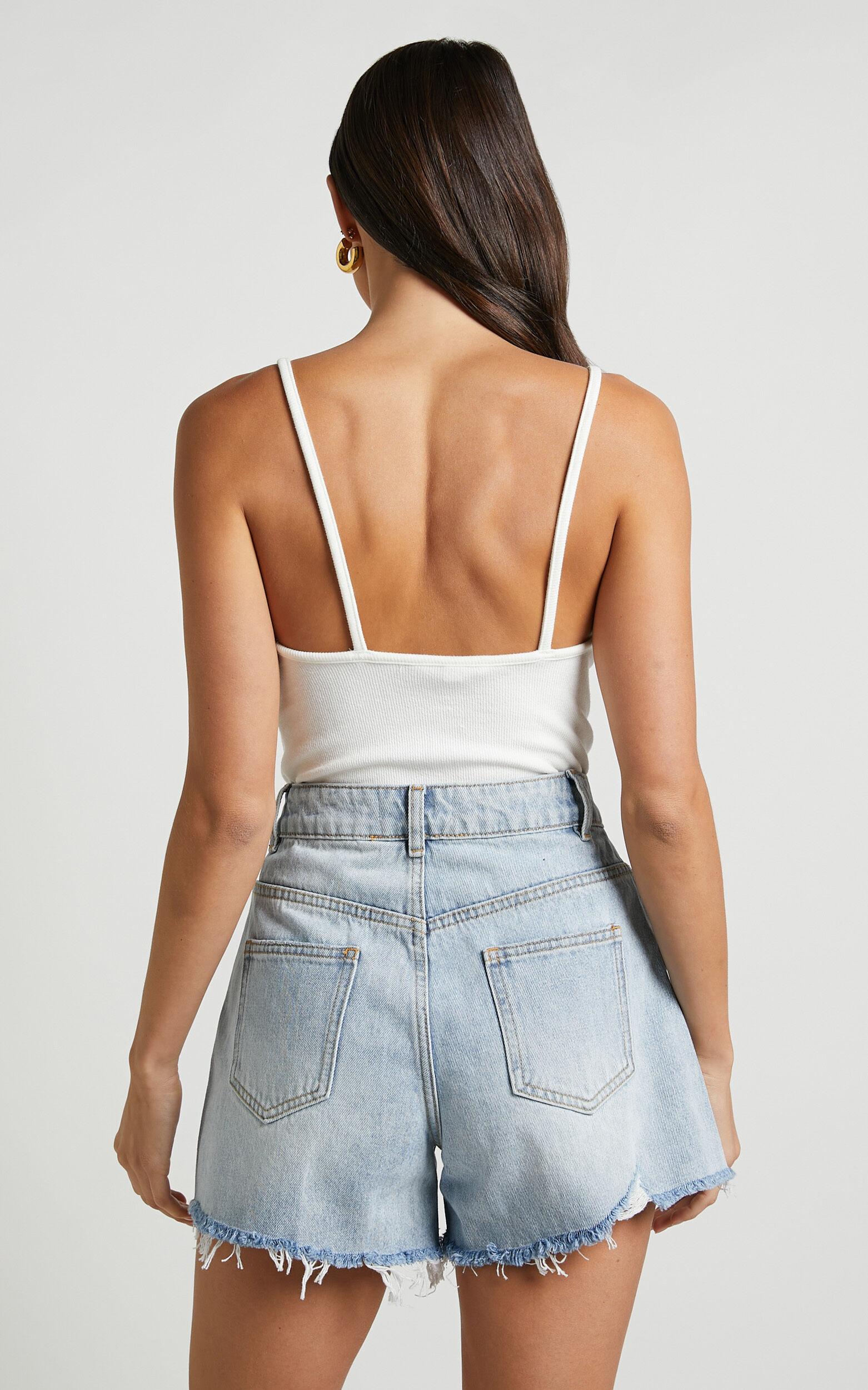 Eloisa Shorts - Recycled Cotton Raw Hem Denim Shorts in Mid Blue Wash Product Image