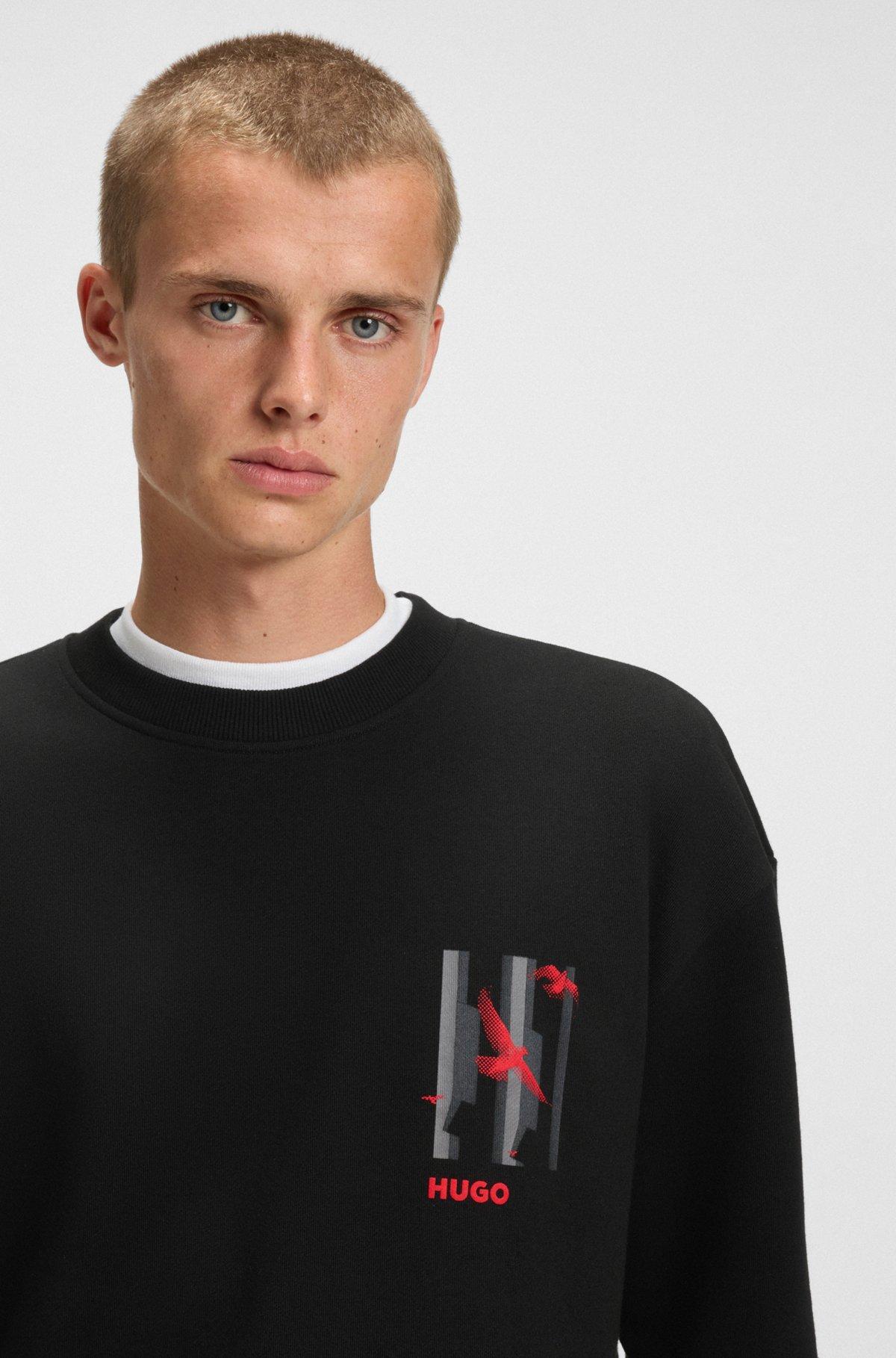 HUGO - Cotton-terry sweatshirt with bird artwork - Black Product Image