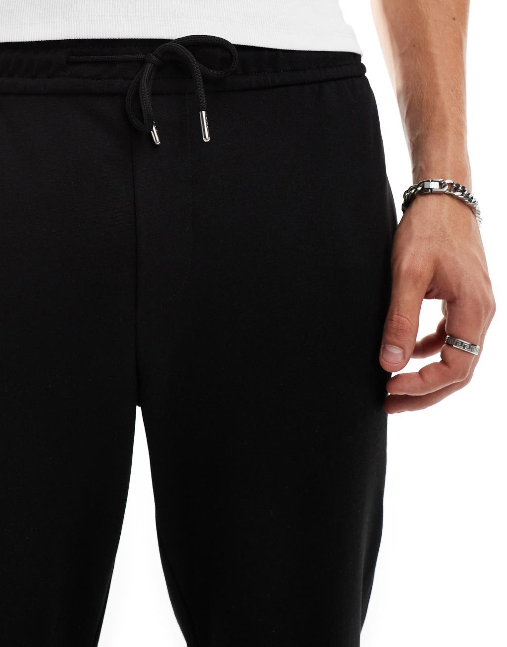 Jack & Jones tapered drawstring smart pants in black  Product Image