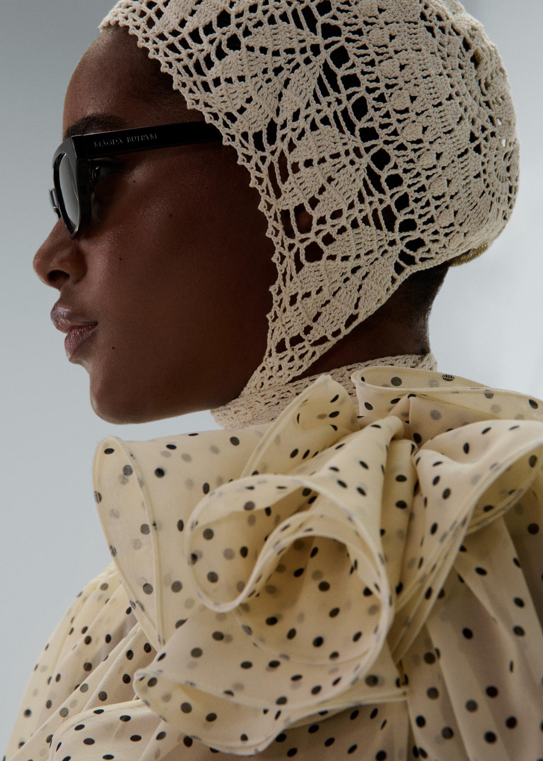 Crochet bonnet in cream Product Image