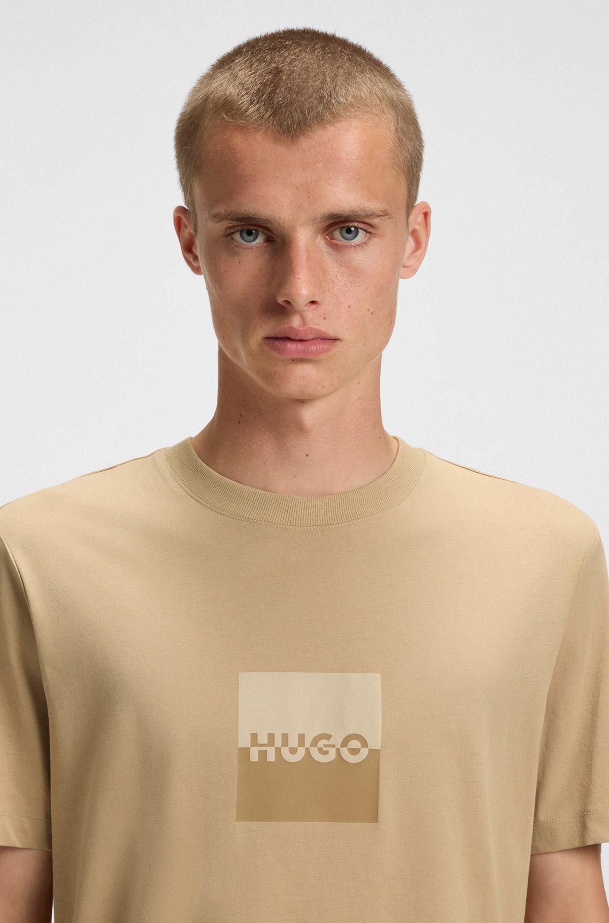 HUGO - Cotton-jersey T-shirt with split-logo print - Beige Product Image