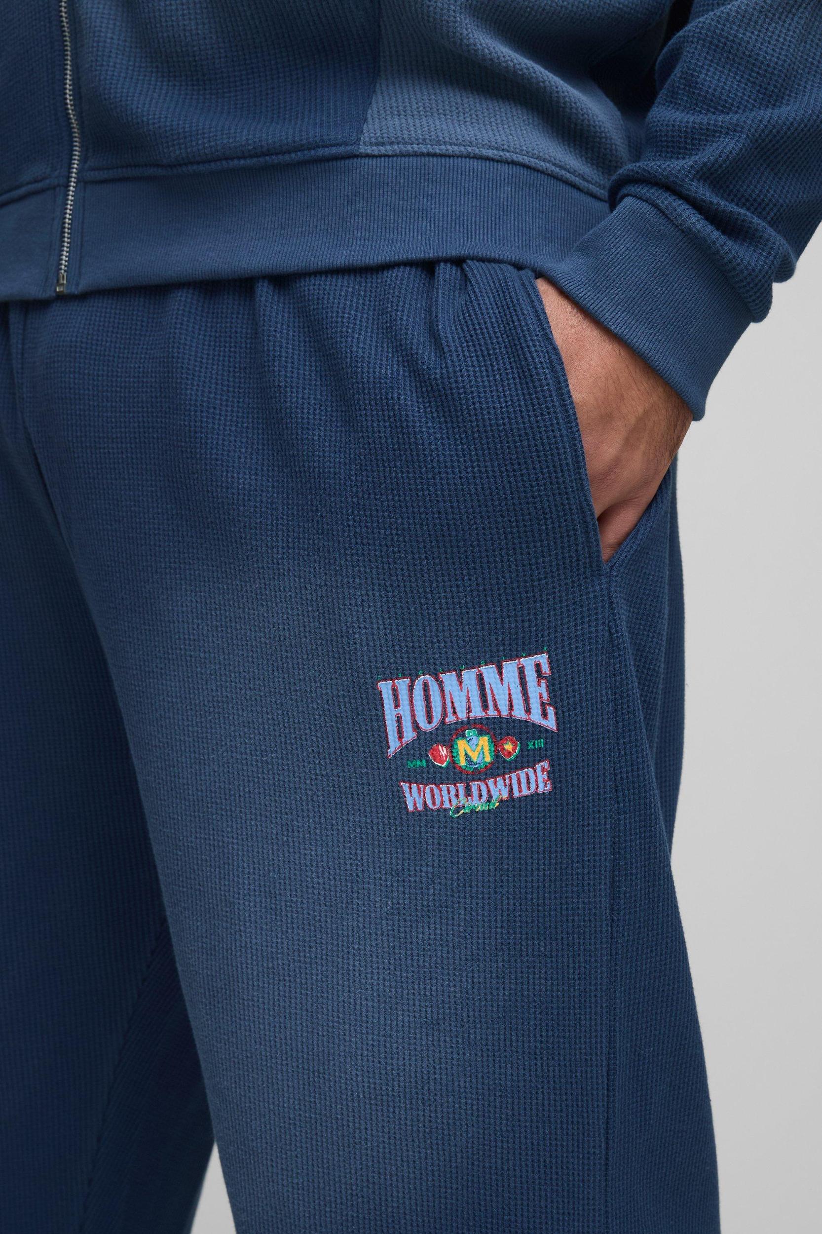 Plus Spray Wash Waffle Graphic Oversized Sweatpants | boohooMAN USA Product Image