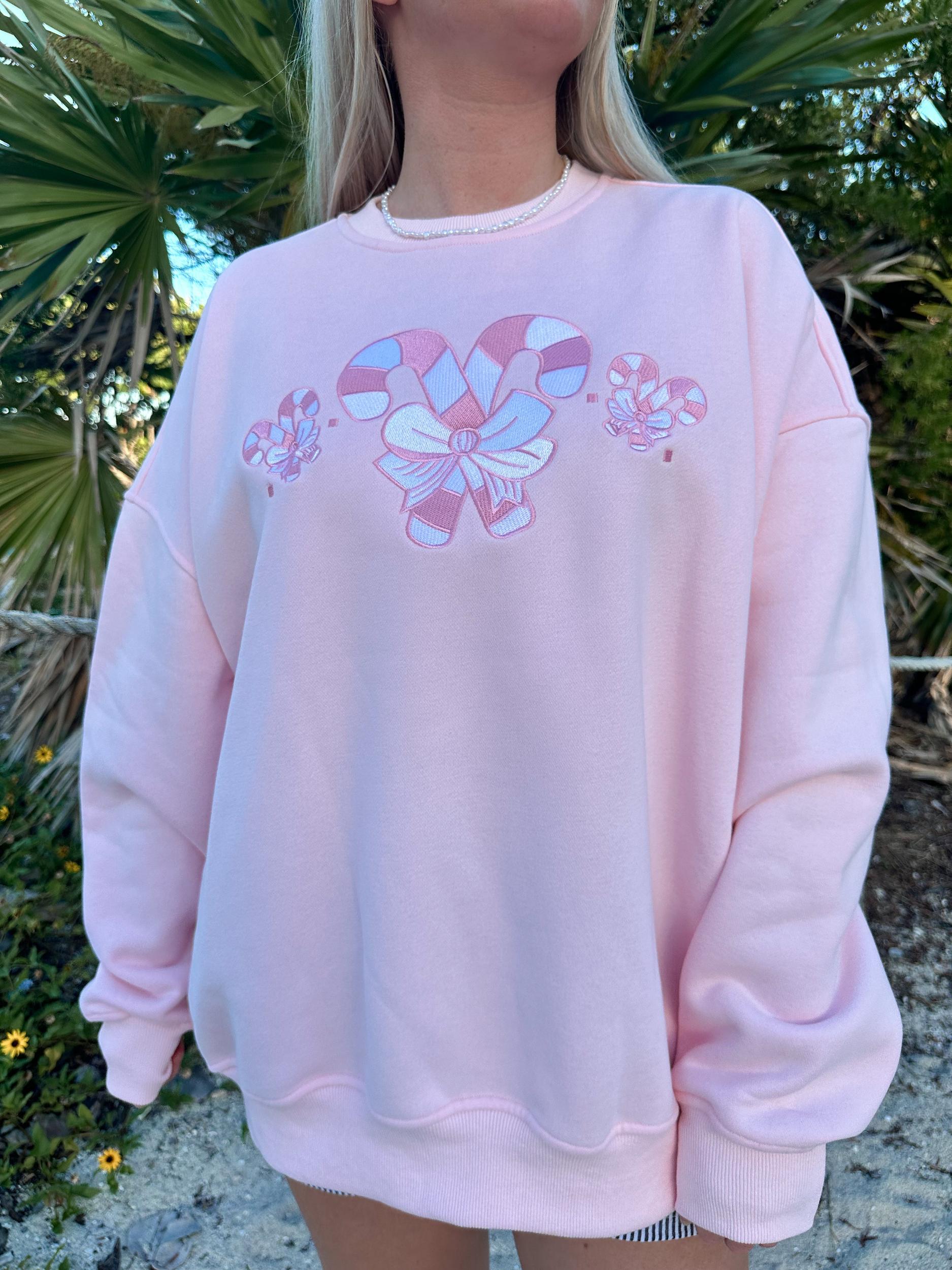 Light Pink Candy Cane Wonderland Sweatshirt Product Image