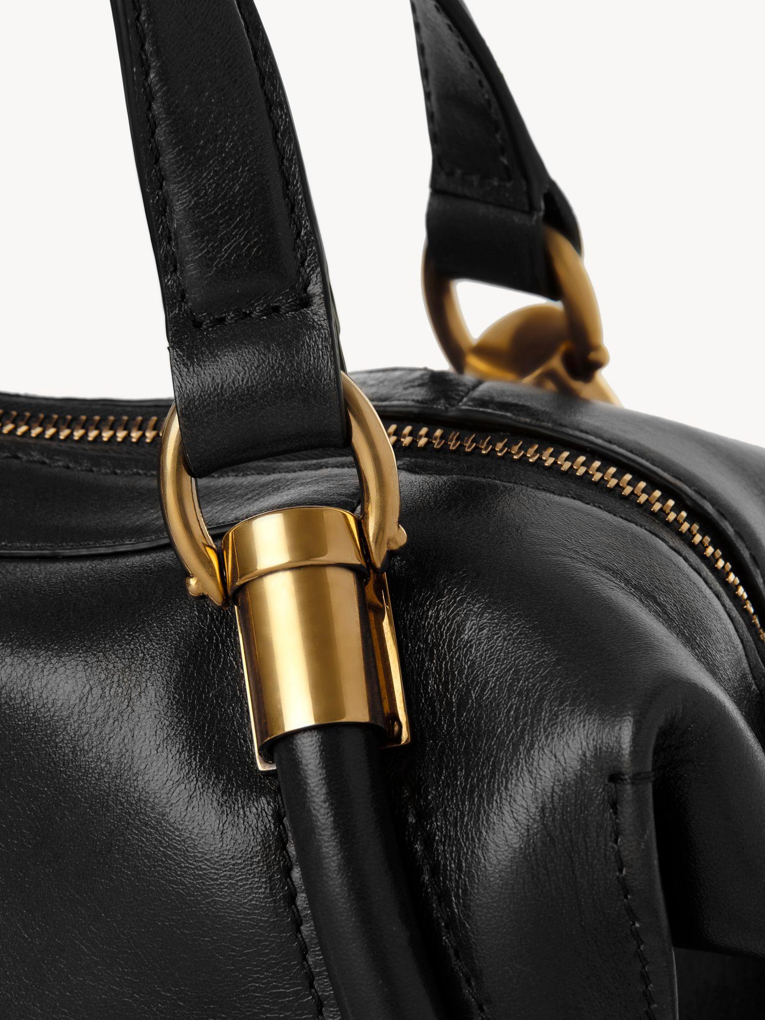 Small Paraty 24 bag in shiny leather Product Image