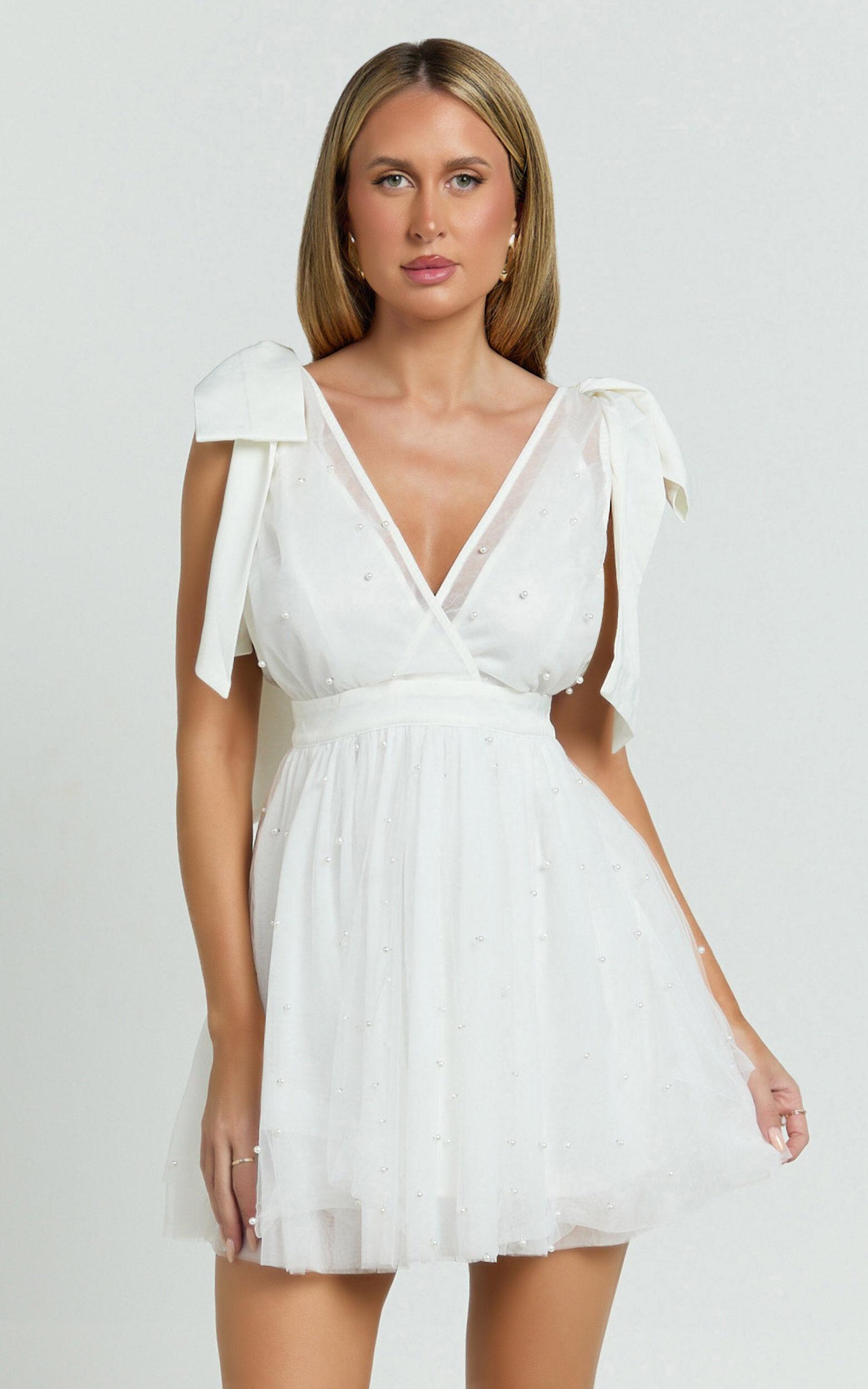 Karalyn Mini Dress - Bow Strap Plunge Pearl Detail Dress in White Product Image