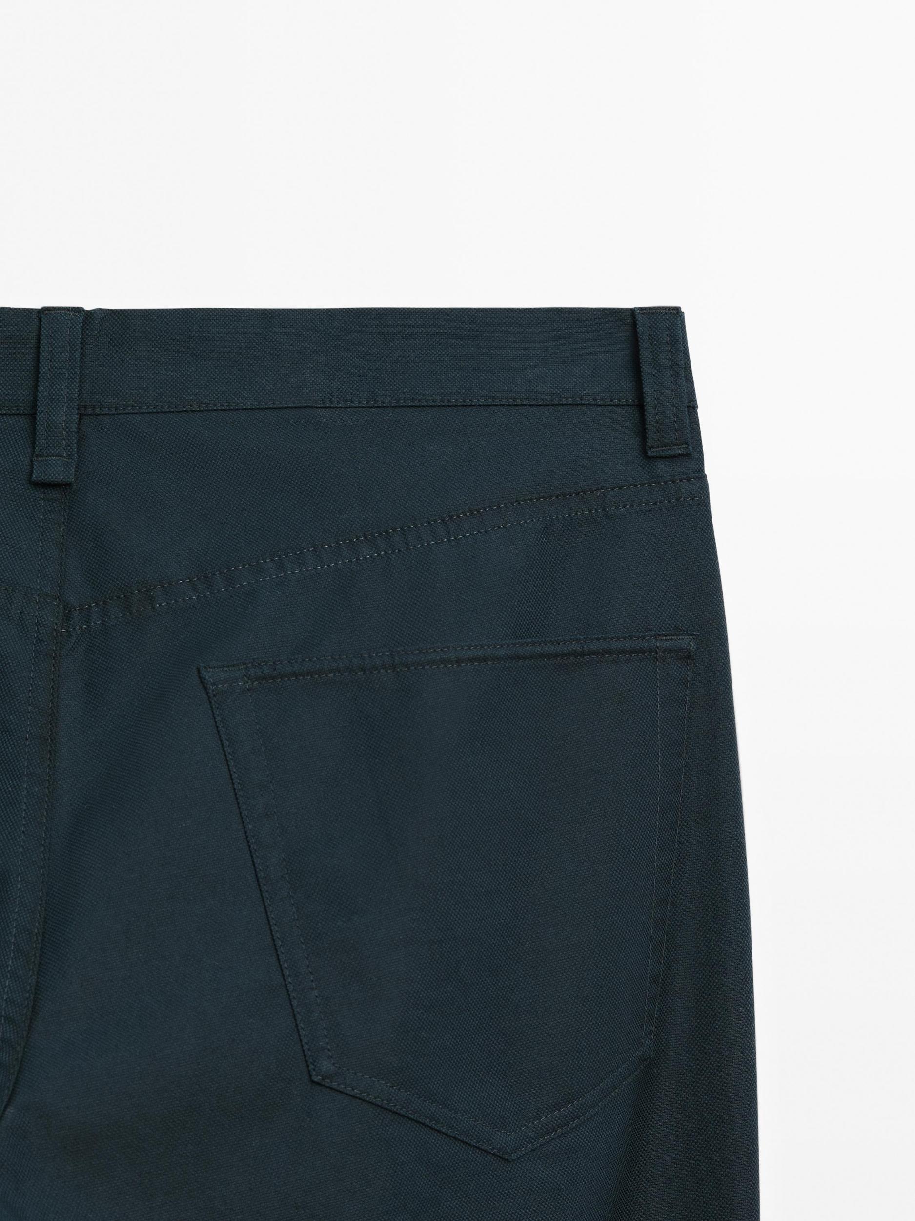 Lightweight tapered fit denim-effect trousers Product Image