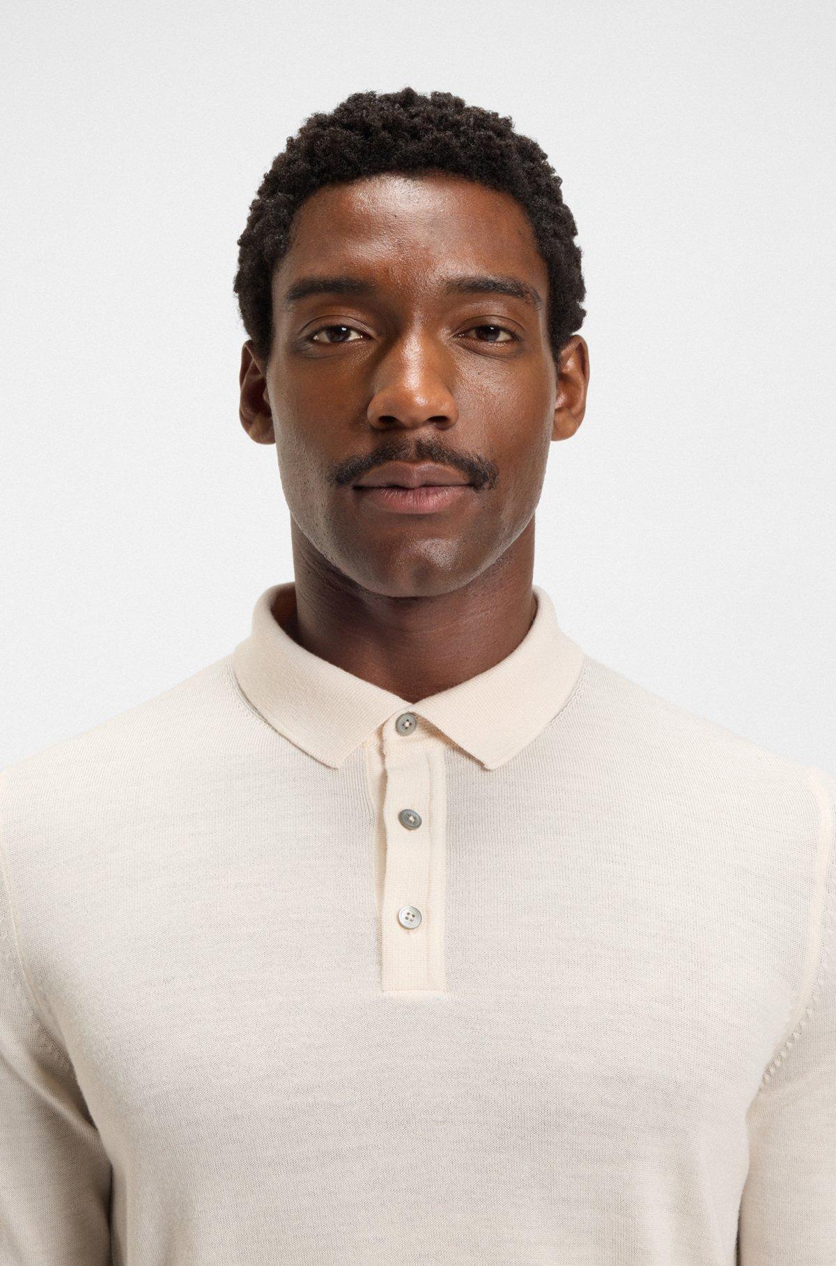 Knitted polo sweater in virgin wool Product Image