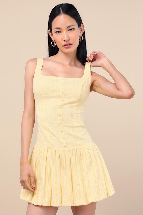 Khamari Yellow Textured Drop Waist Bubble-Hem Mini Dress Product Image