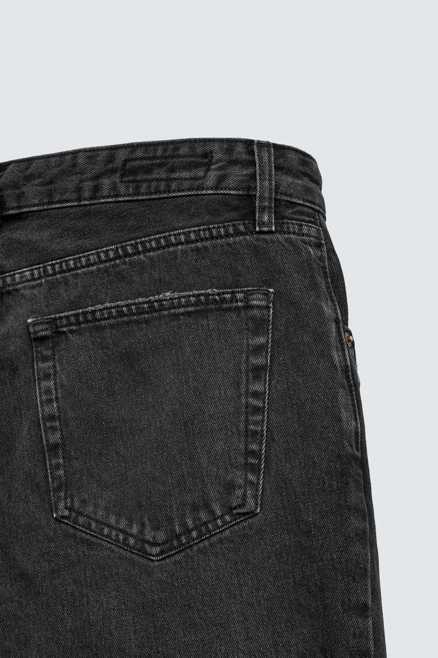 FLARE FIT RIPPED JEANS Product Image