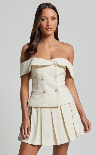 Maggie Mini Skirt - Pleated Mid Rise Boucle Skirt in Cream Product Image