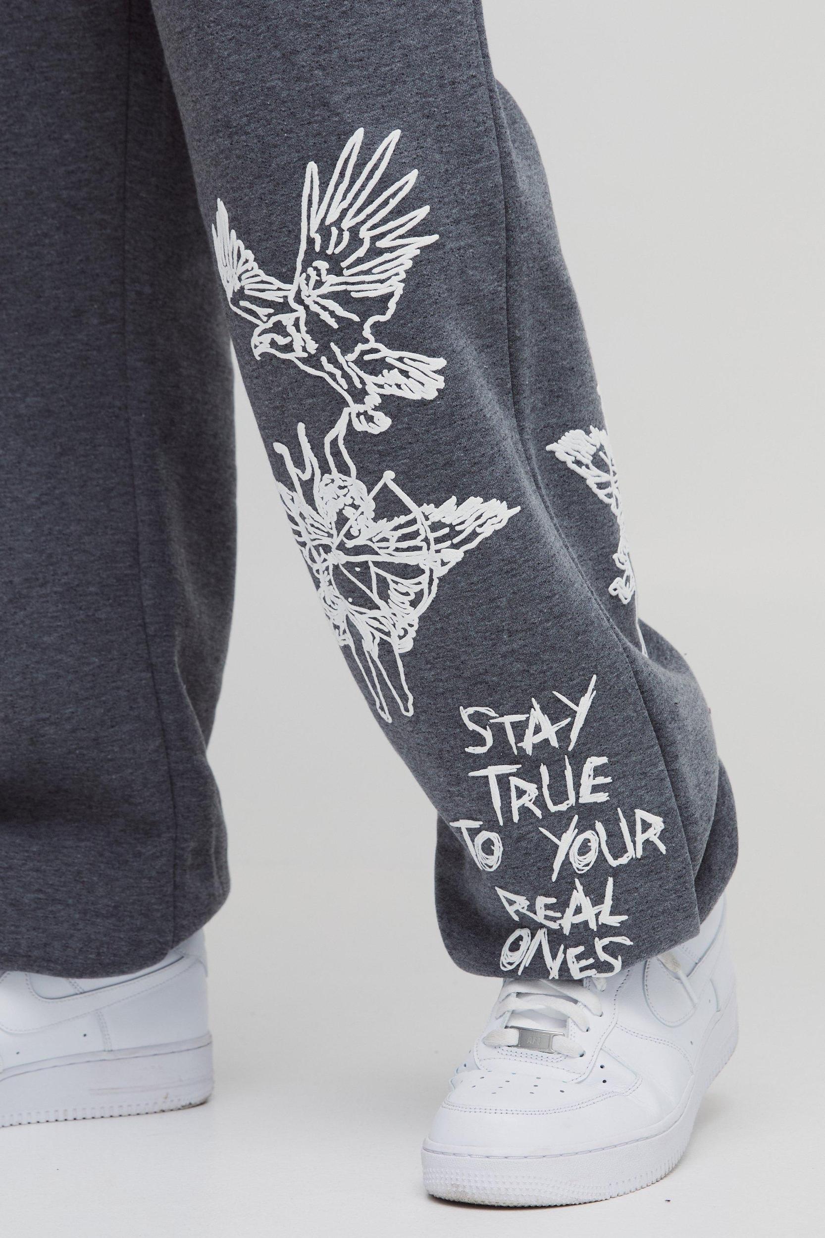 Oversized Graffiti Slogan Cuffed Sweatpants | boohooMAN USA Product Image