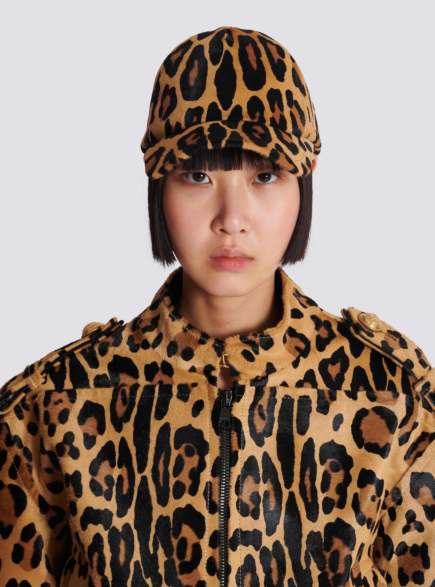 Ponyskin-style leather cap with leopard pattern Product Image