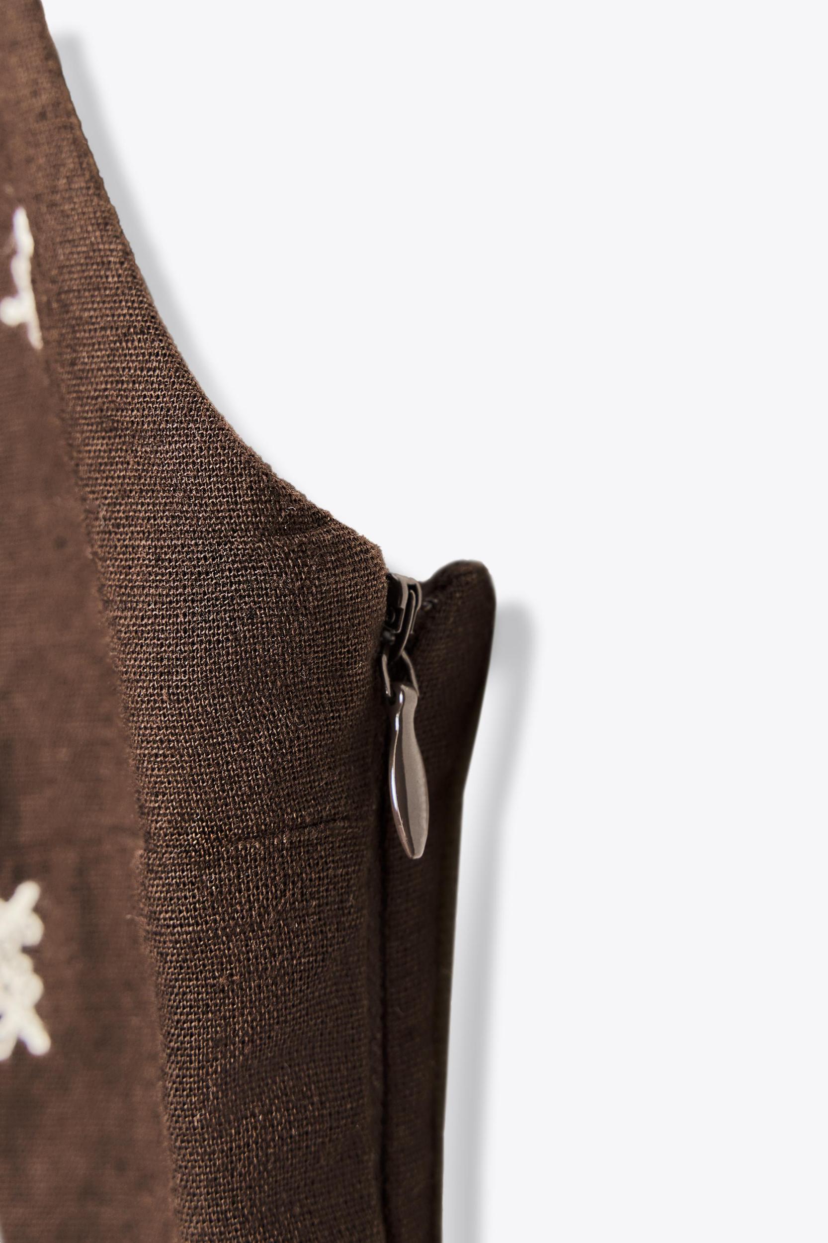 EMBROIDERED PEPLUM TOP Product Image