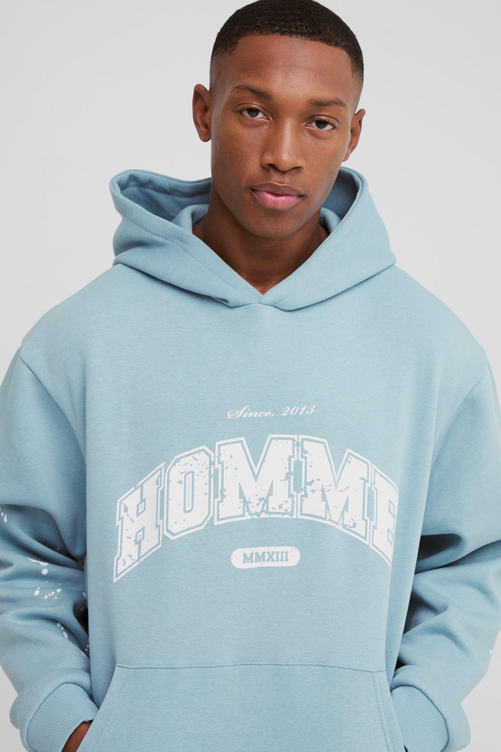 Oversized Boxy Paint Splatter Homme Hoodie | boohooMAN USA Product Image