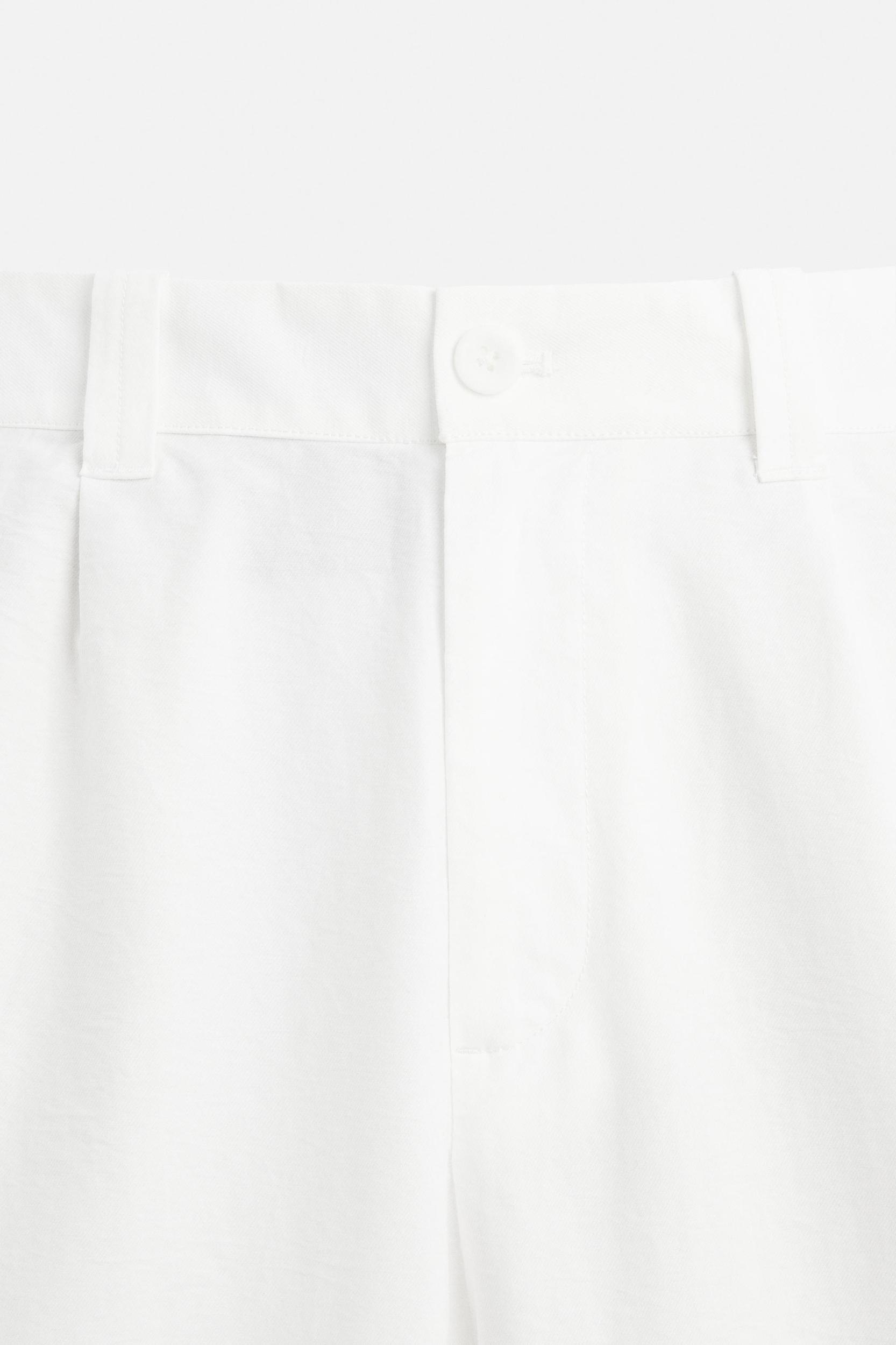 RELAXED FIT PLEATED PANTS Product Image