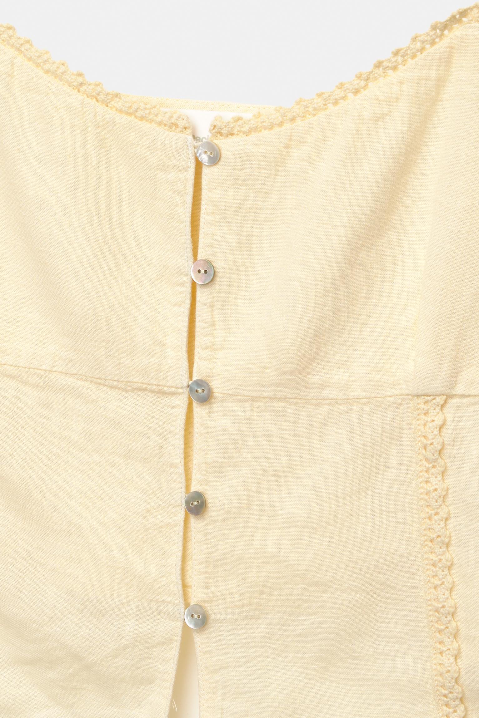 Lace-trimmed top with straps Product Image