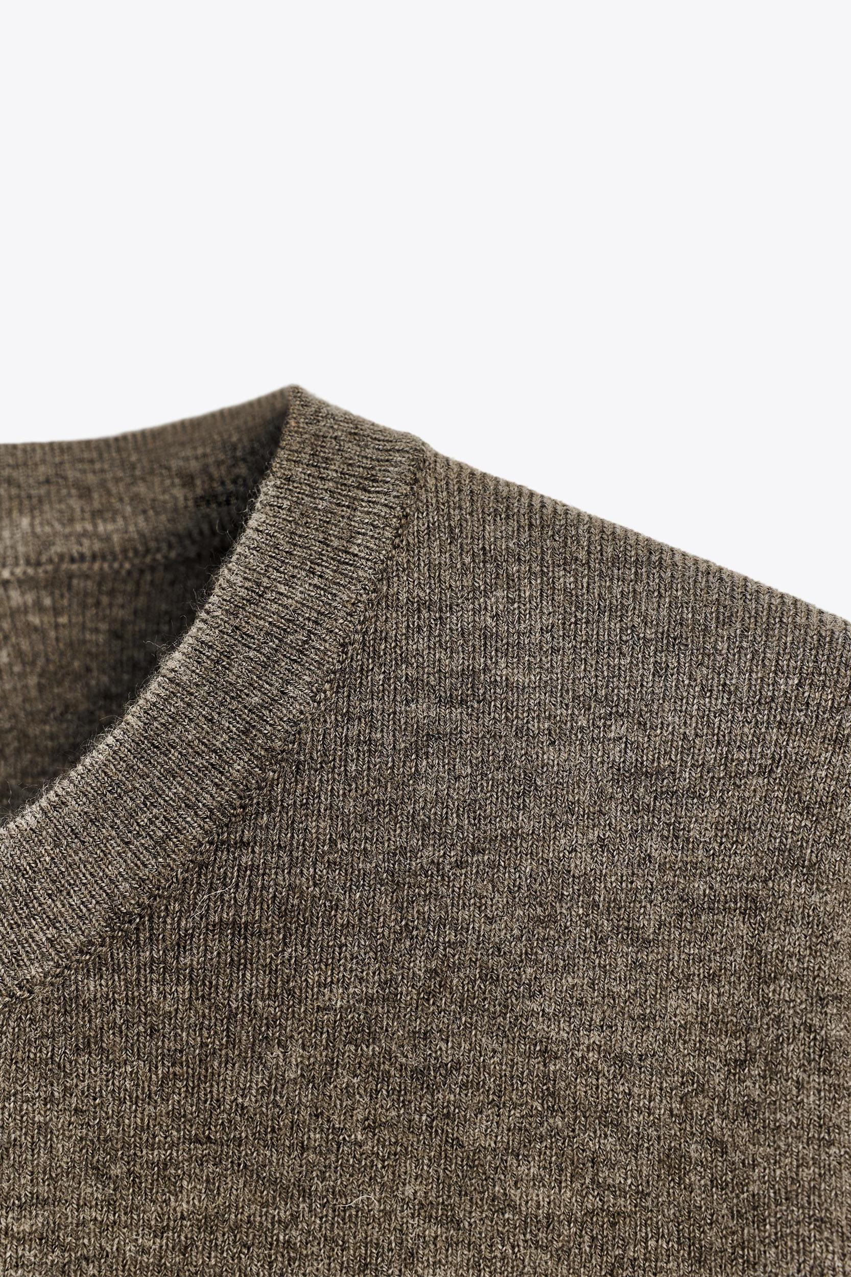 SOFT FEEL SHORT SLEEVE KNIT TOP Product Image