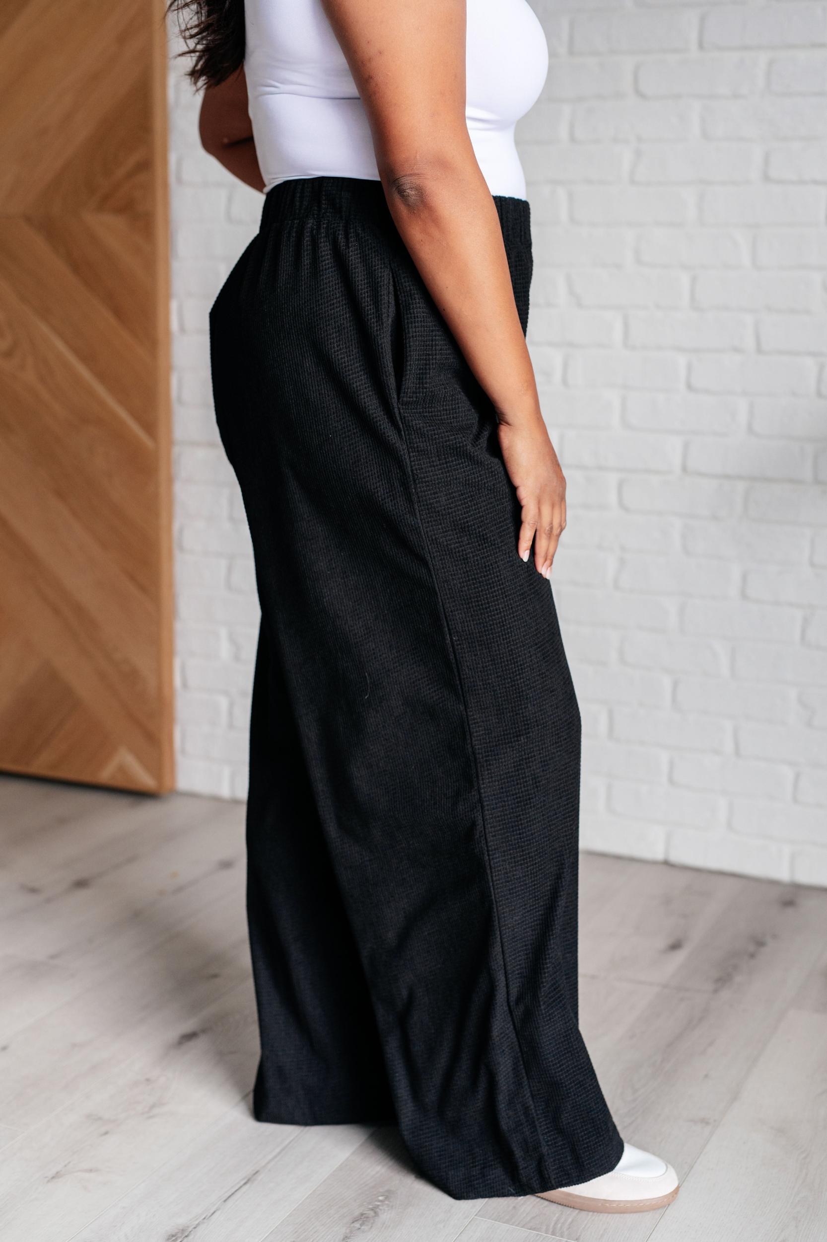 Just a Flirt Pleated Skirt in Black Product Image