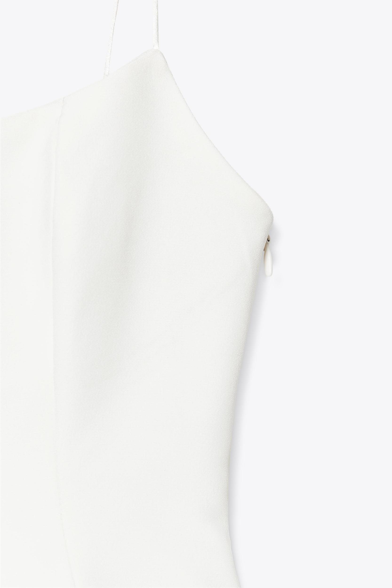 STRETCH PEPLUM TOP Product Image