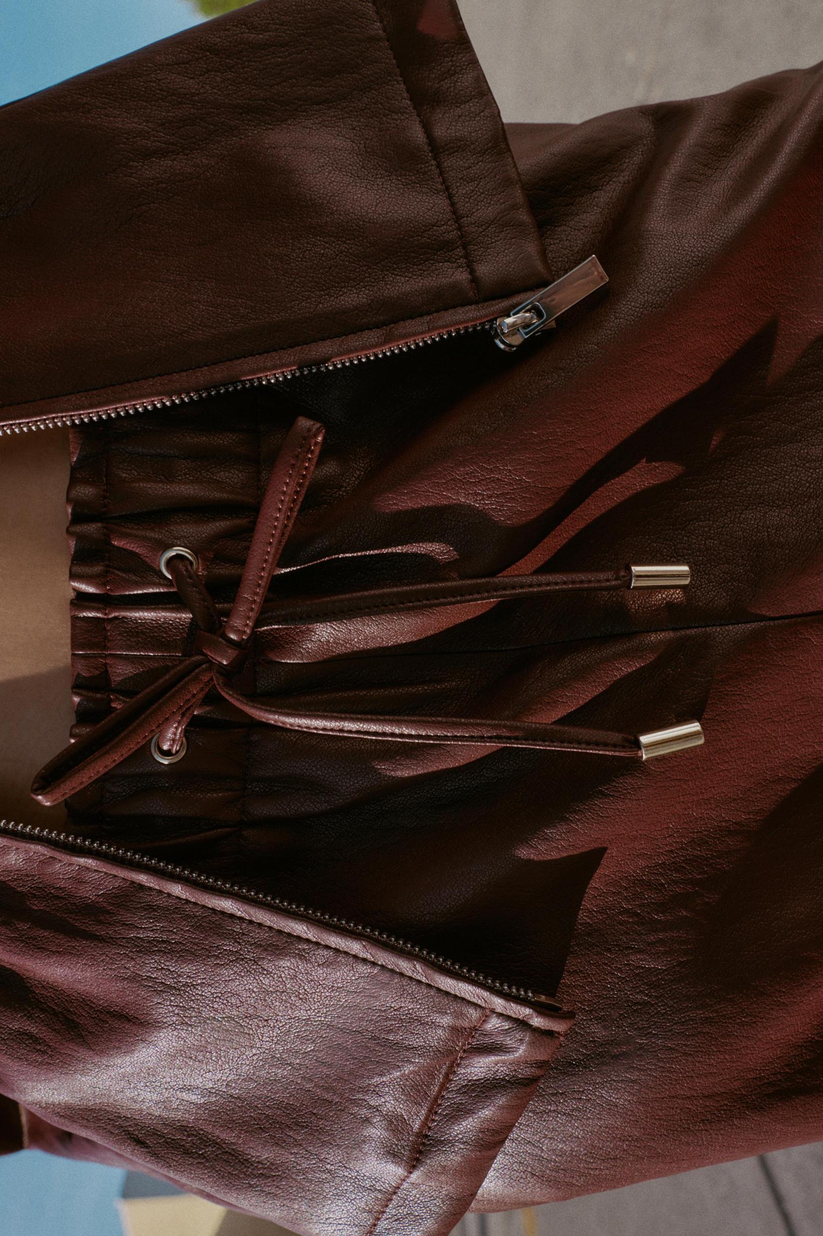 FAUX LEATHER ELASTIC WAIST PANTS Product Image