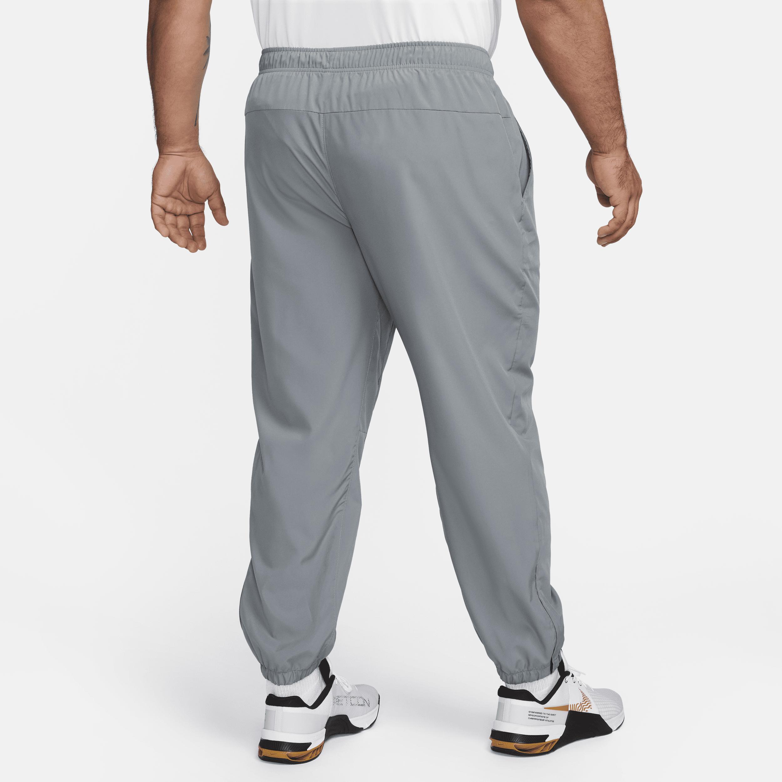Nike Mens Form Dri-FIT Tapered Versatile Pants | FB7497-084 Product Image