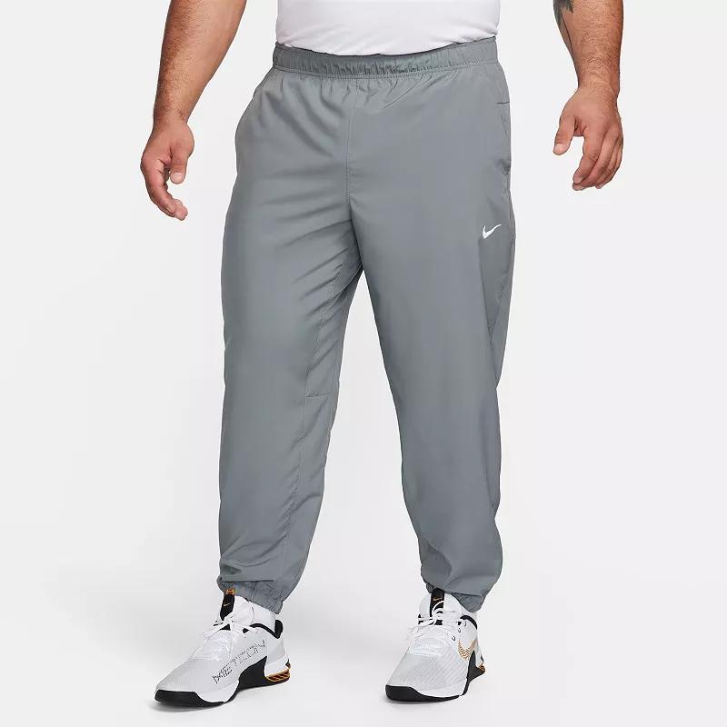 Nike Mens Form Dri-FIT Tapered Versatile Pants | FB7497-084 Product Image