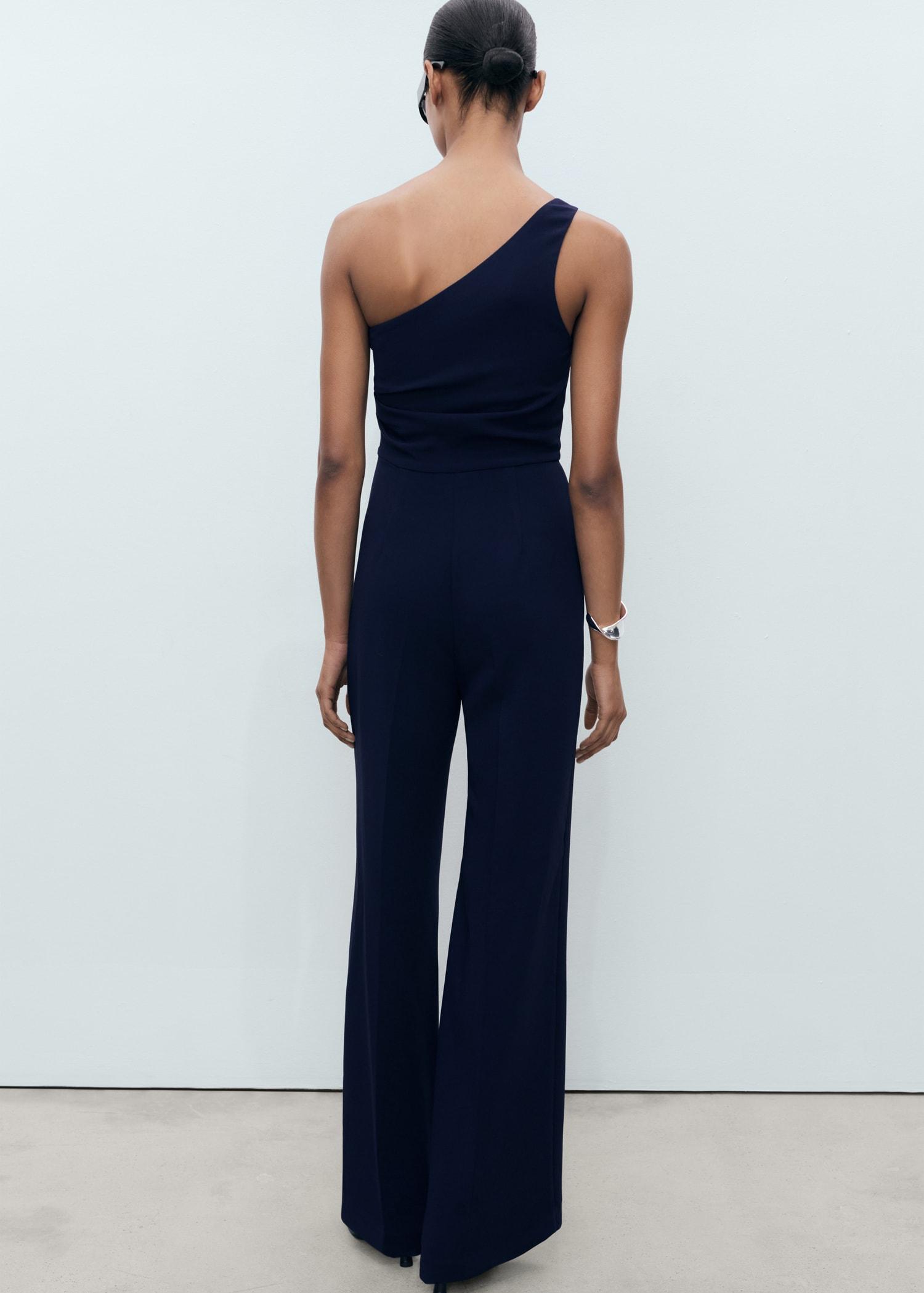 Asymmetrical jumpsuit with metallic detail - Women | MANGO USA Product Image