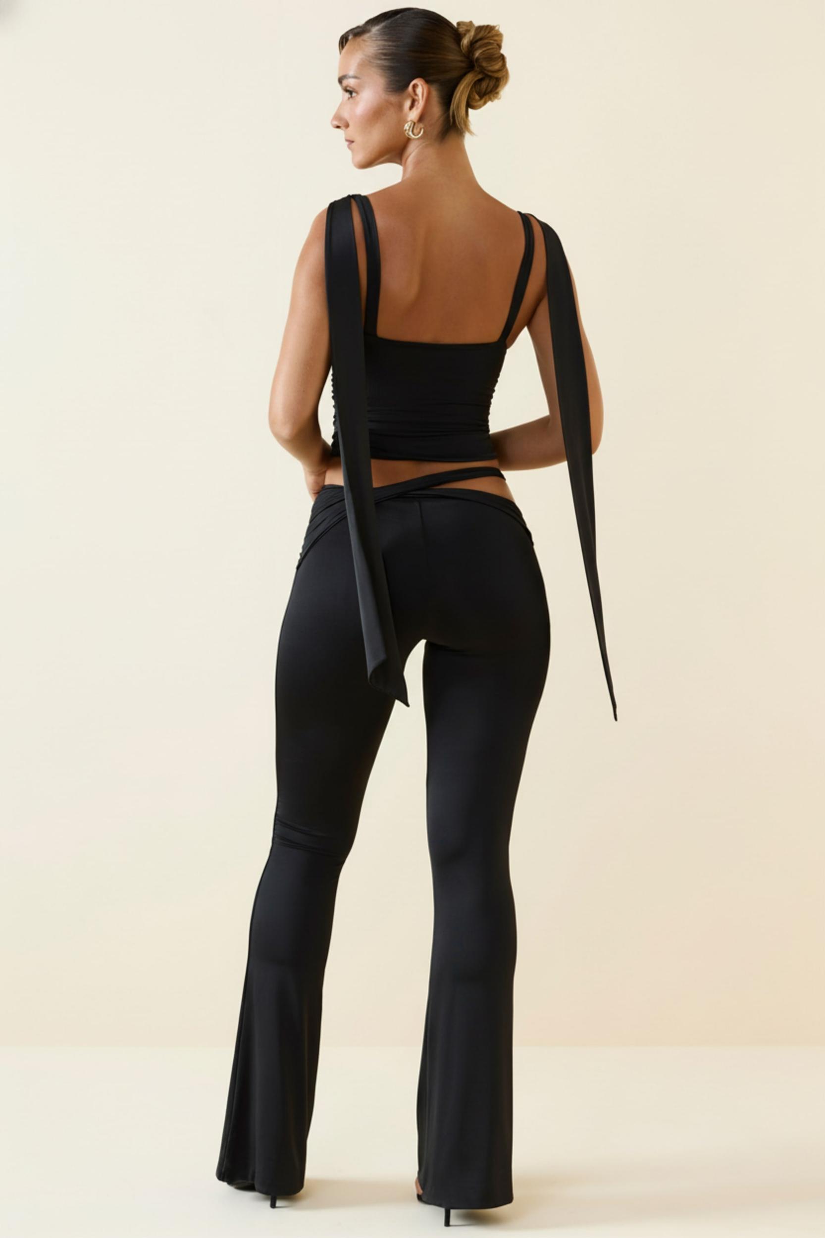 Cut-Out Mid-Rise Flared Trousers in Black Product Image