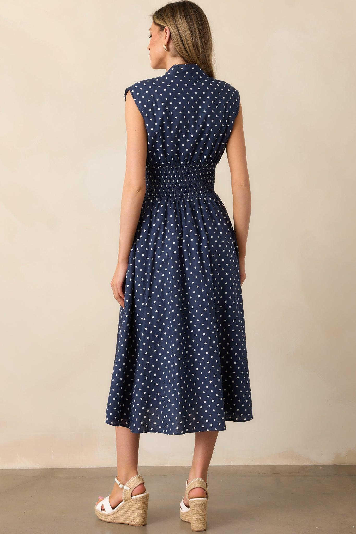 The Evette Navy Polka Dot Zip Front Midi Dress Product Image