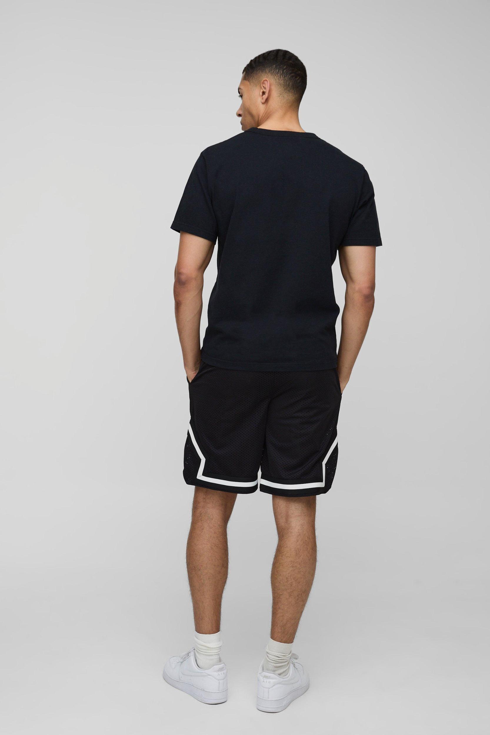Worldwide Mid Length Mesh Basketball Shorts | boohooMAN USA Product Image