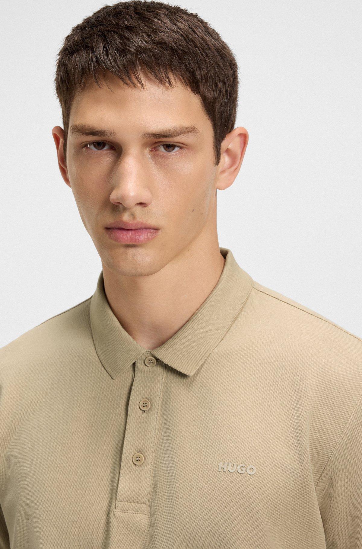 HUGO - Cotton-piqué polo shirt with all-over print - Beige Product Image