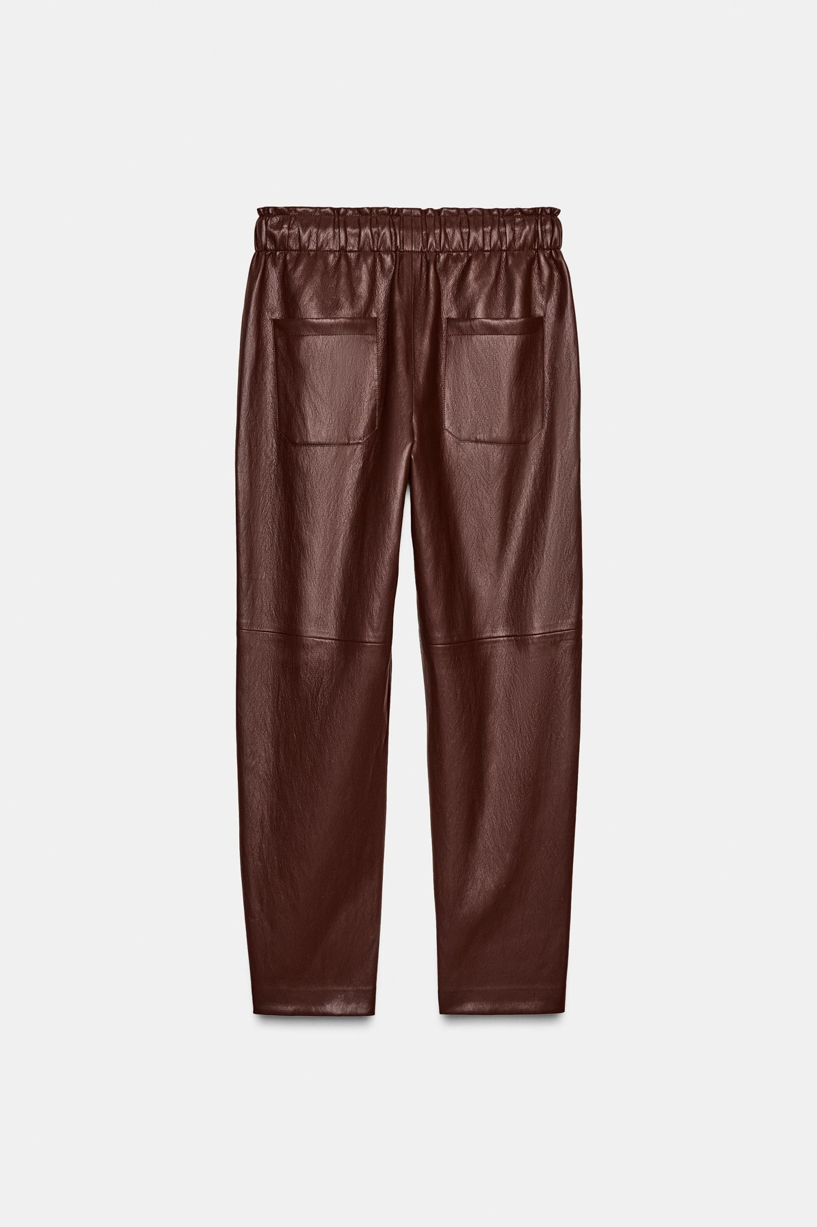 FAUX LEATHER ELASTIC WAIST PANTS Product Image