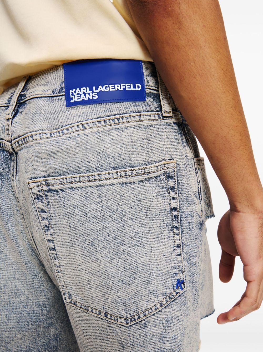 distressed relaxed denim shorts Product Image