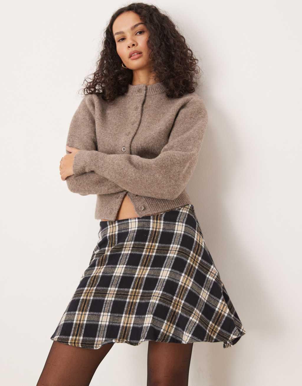 ASOS DESIGN flippy mini skirt in black check Product Image