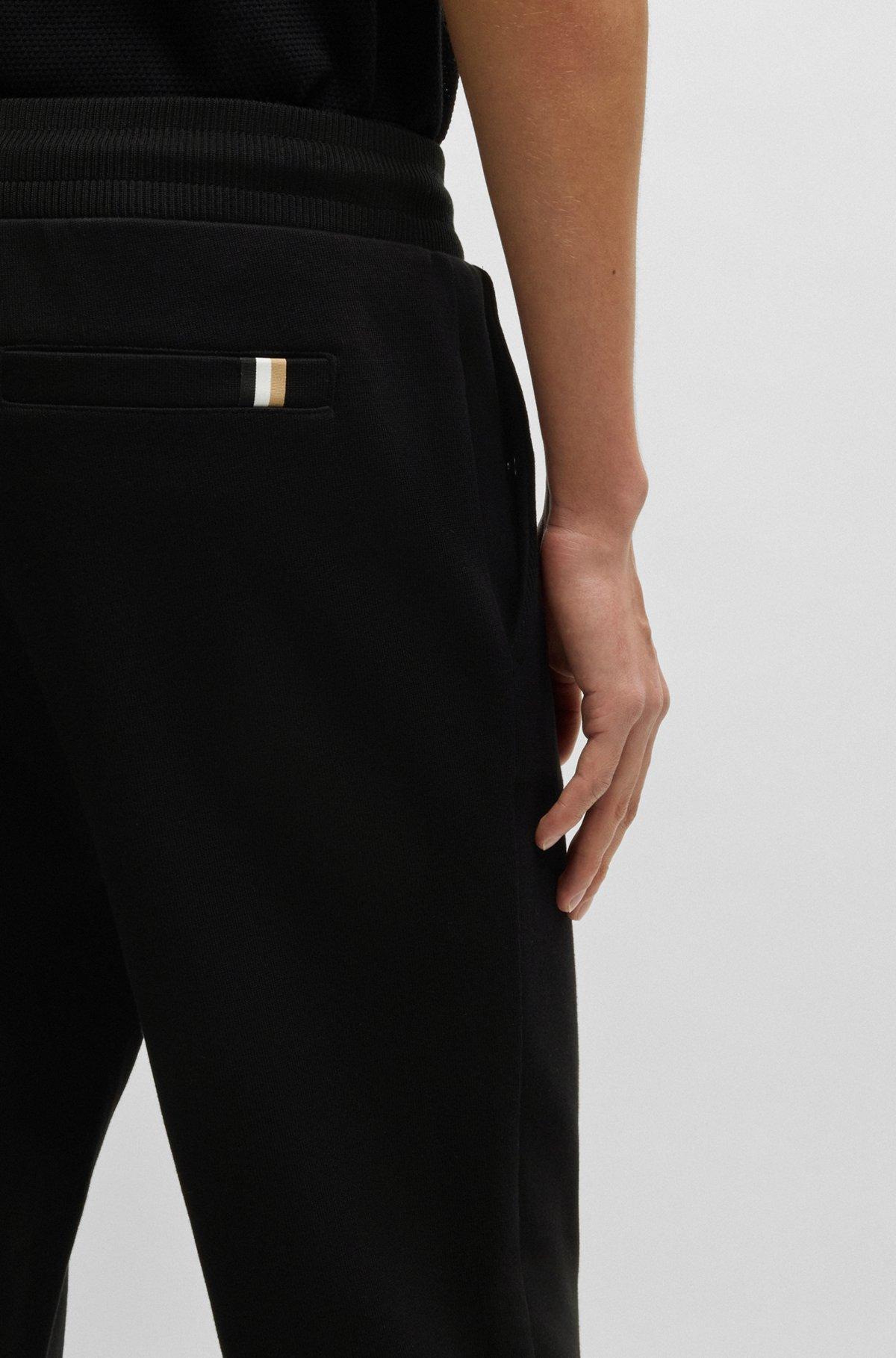 Mercerized-cotton tracksuit bottoms with stripe waistband Product Image