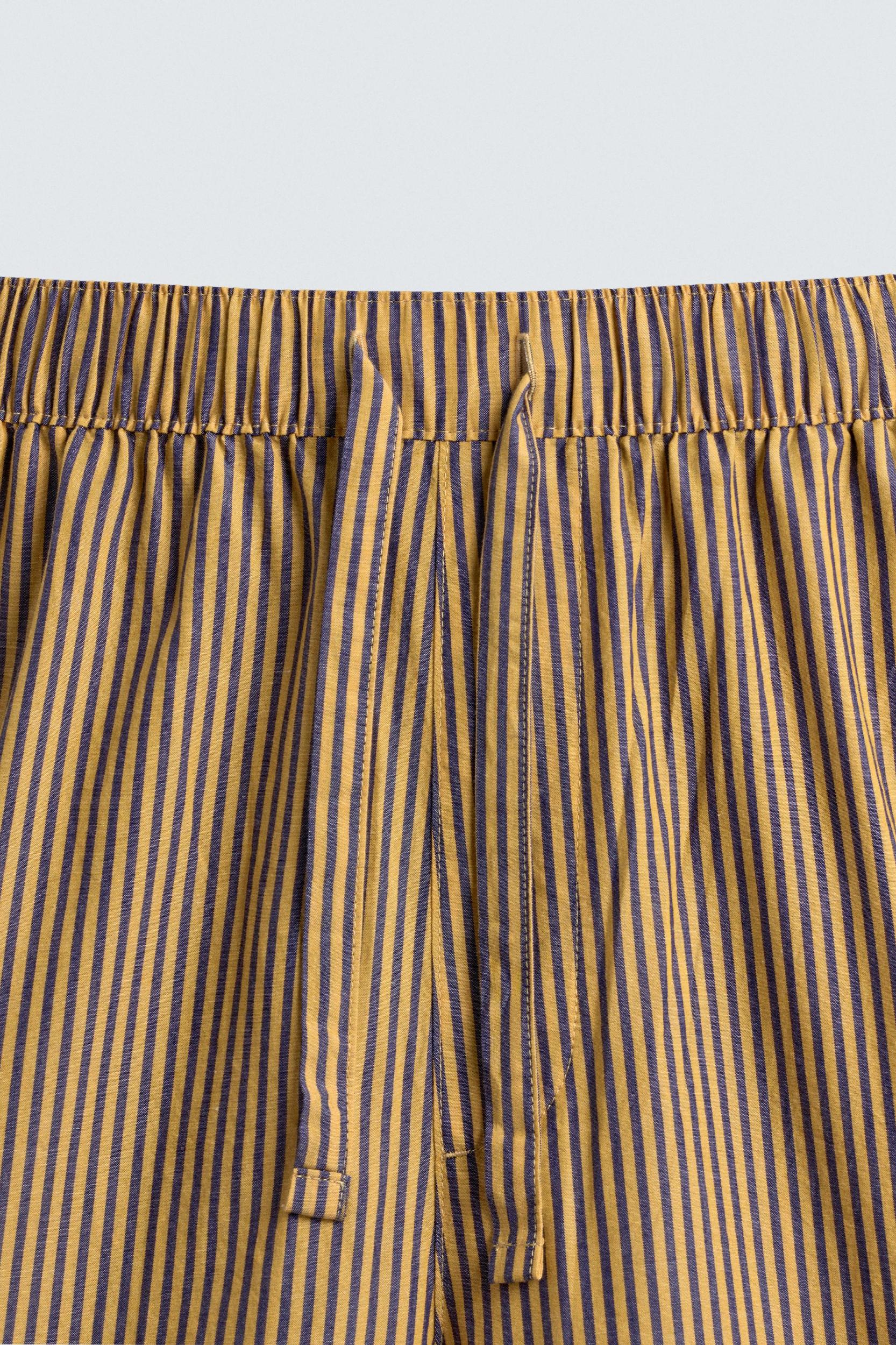 STRIPED OVERSIZED FIT PANTS Product Image